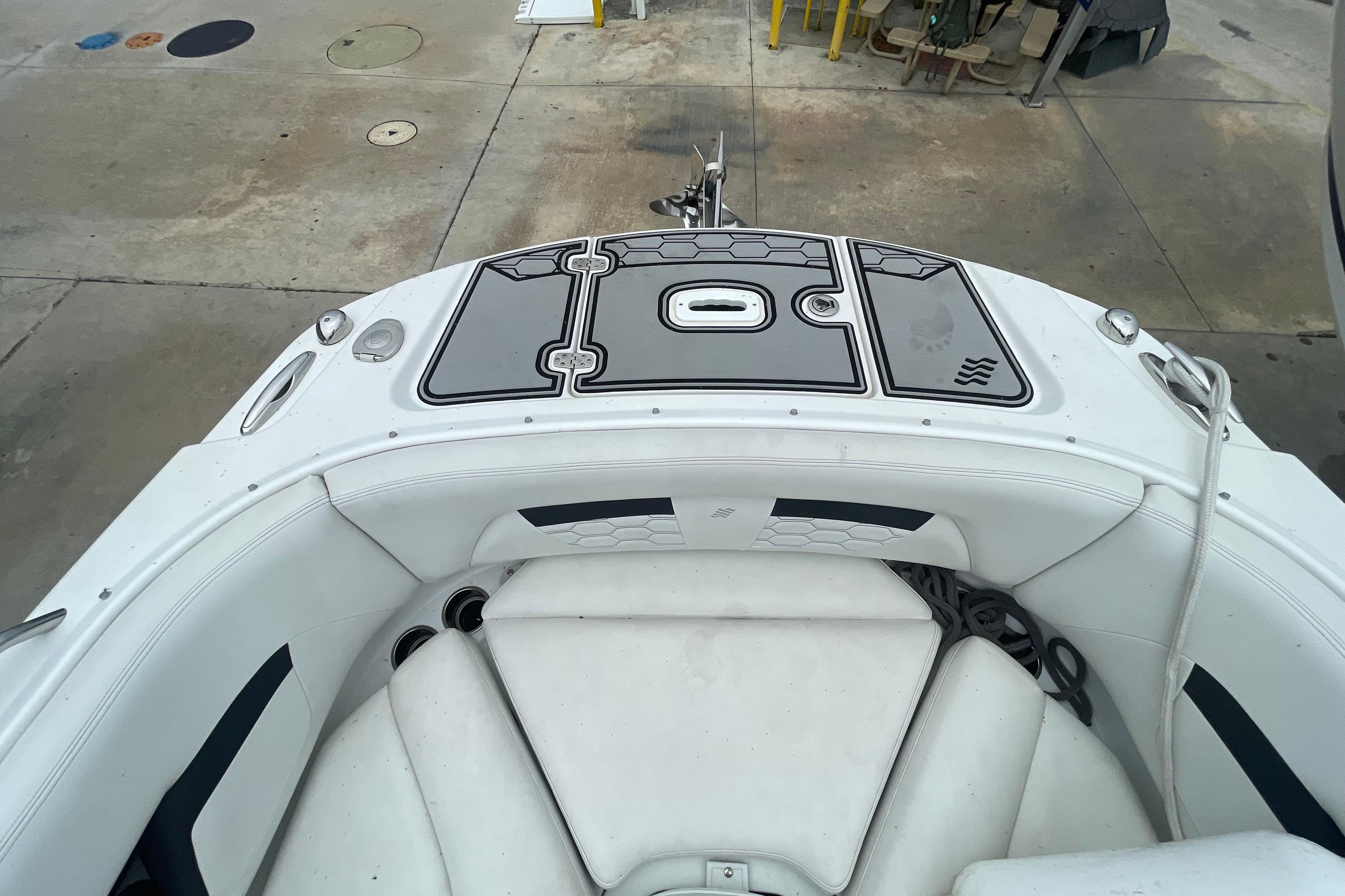 2022 Four Winns HD8 OB boat interior with white seating and deck details.