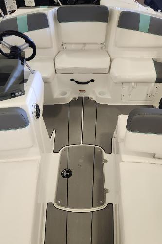 2025 Tahoe T16 boat interior with seating and steering wheel, featuring modern design and comfort.