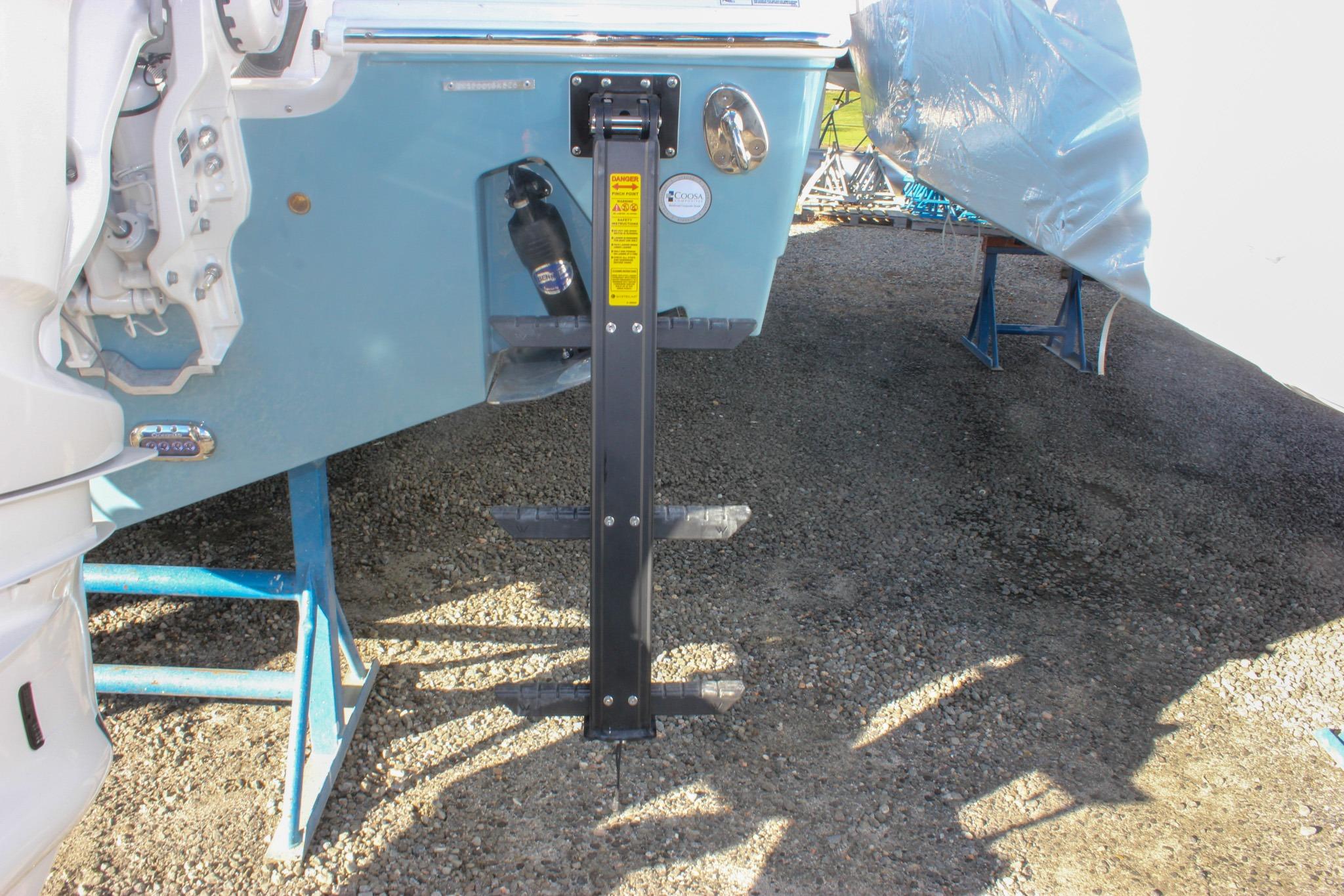 2026 Sea Hunt Ultra 285 SE boat ladder and stern detail.