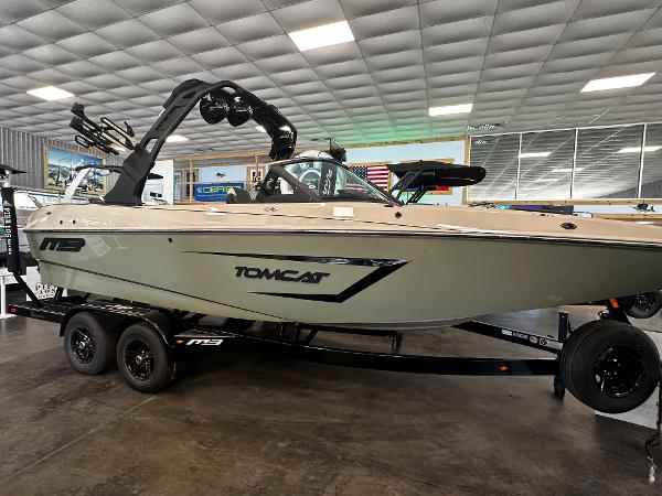 2024 MB F22 Tomcat boat on trailer in showroom.