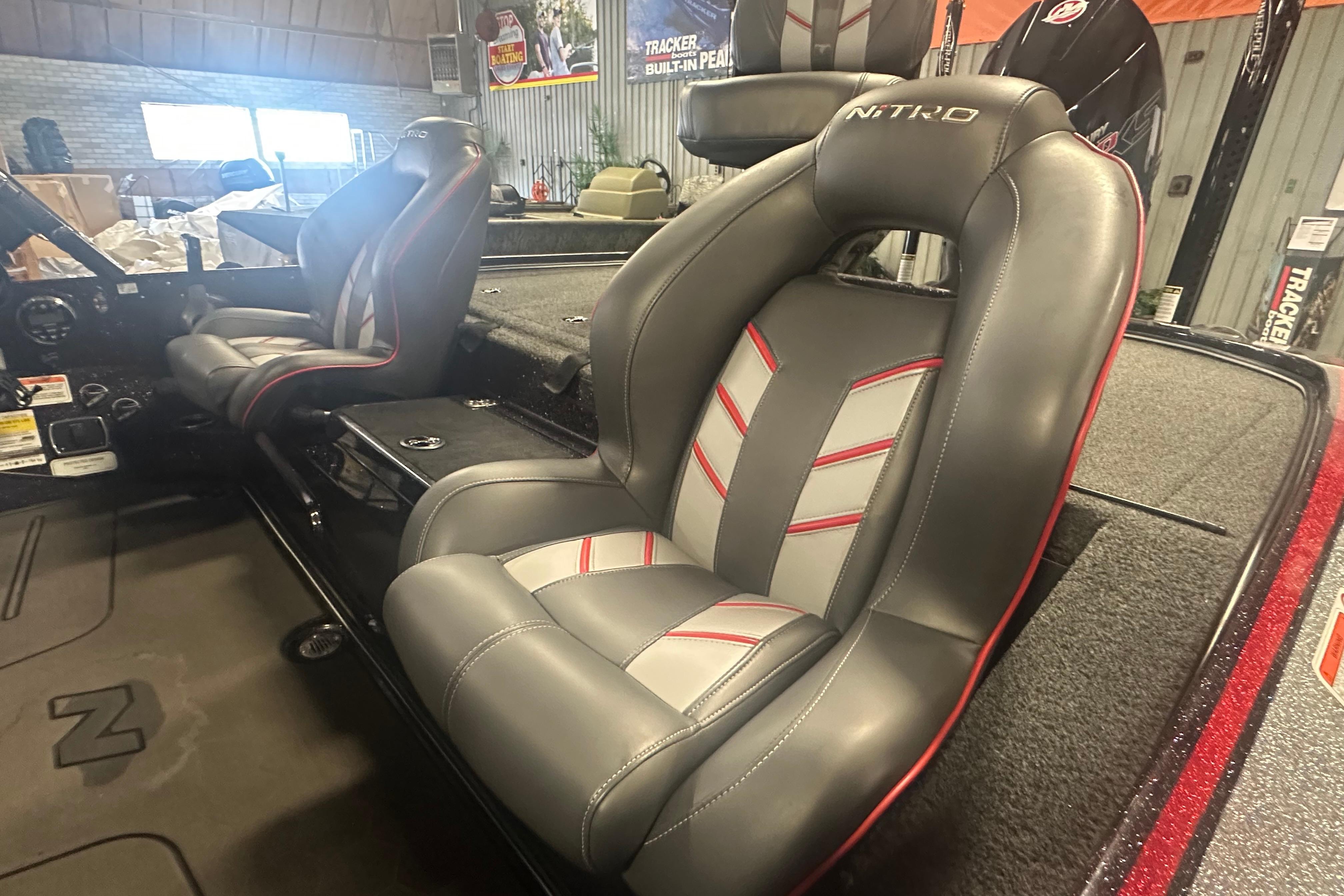 Nitro Z20 Pro 2022 boat interior with sleek, modern seats in a showroom setting.