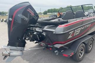 2023 Nitro ZV19 Sport boat with powerful outboard motor, parked on a trailer.
