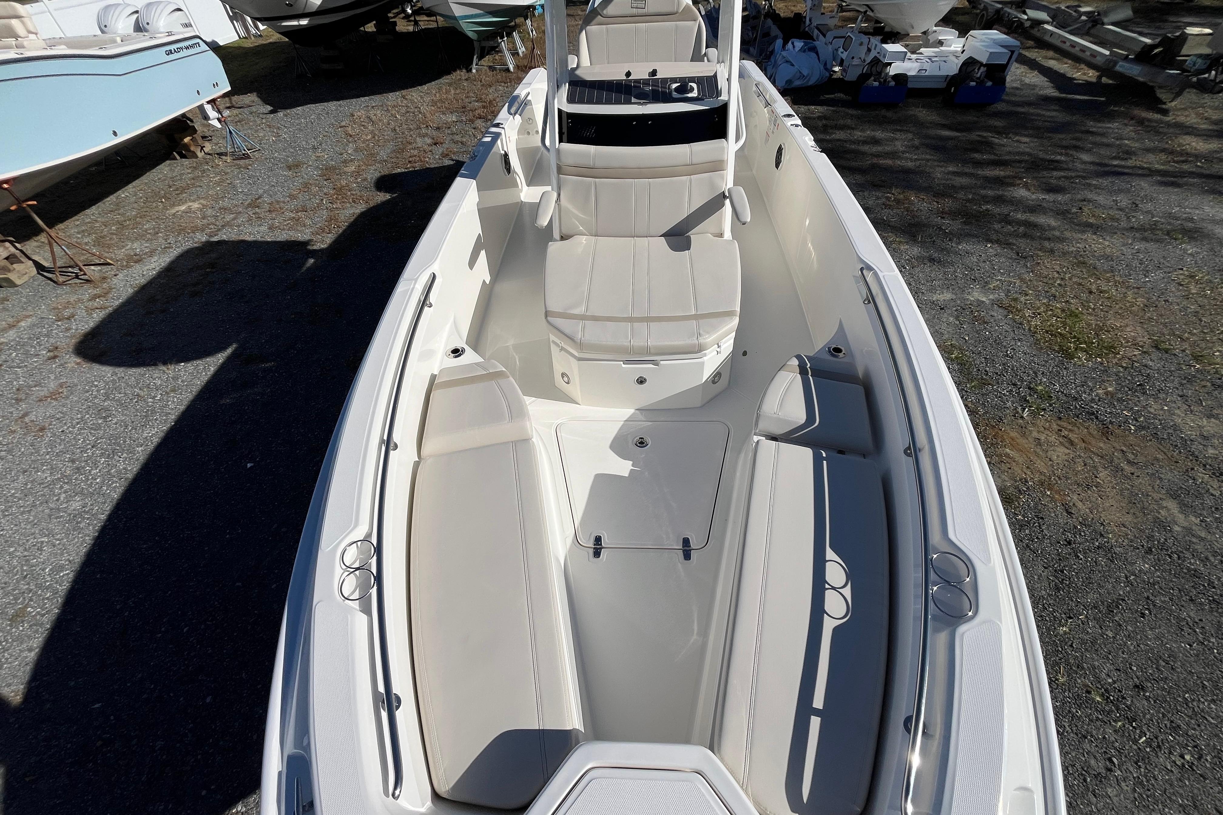 2026 Boston Whaler 280 Dauntless boat interior with spacious seating and sleek design.