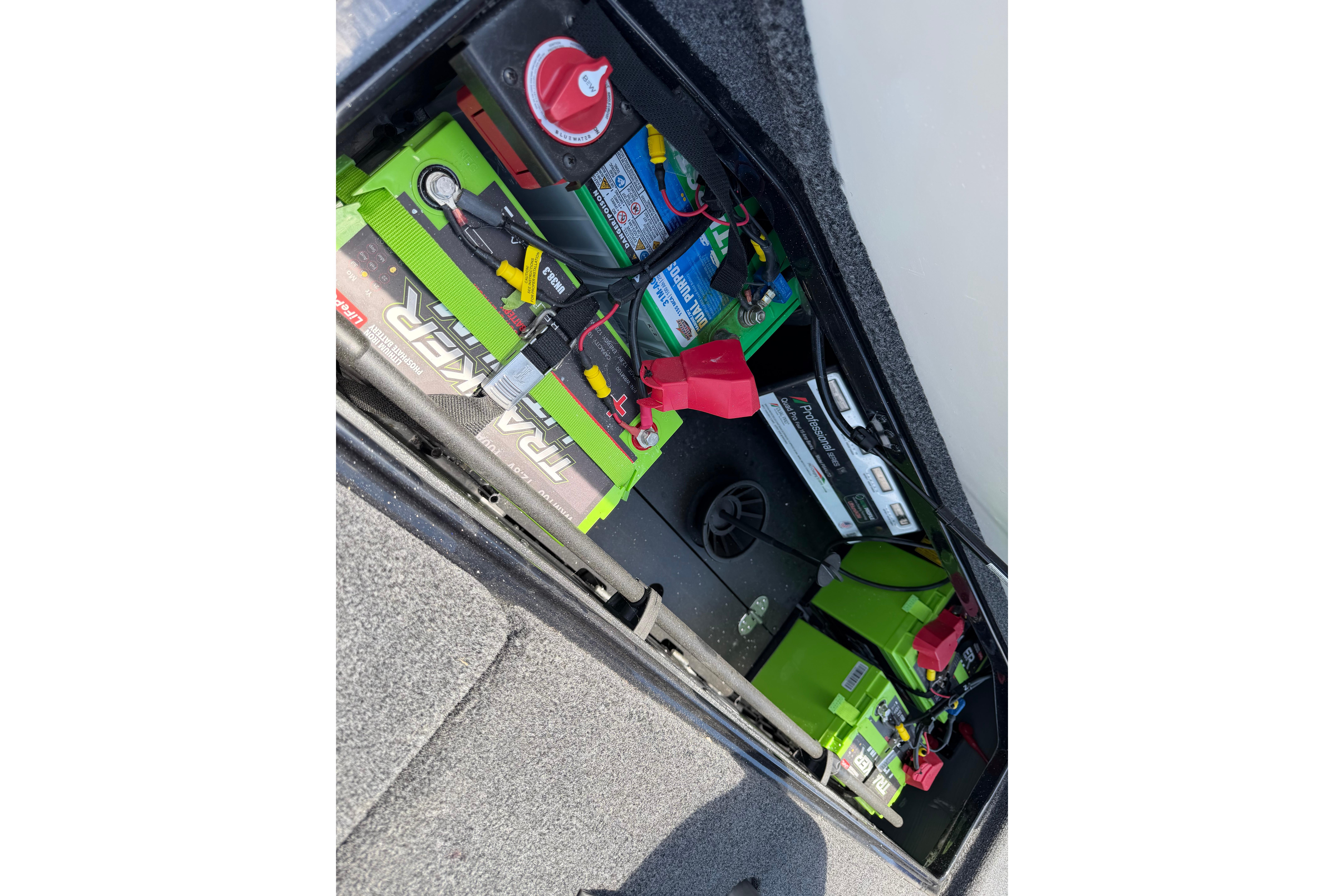 2023 Ranger Z520R boat battery compartment with Tracker lithium batteries and wiring.