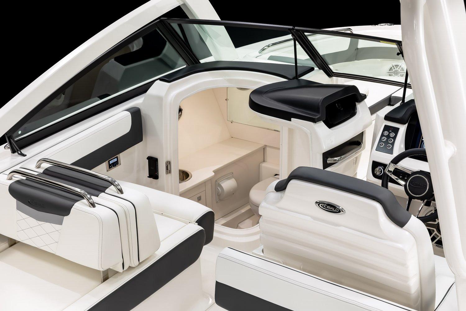 Manufacturer Provided Image: 2026 Robalo R277 Dual Console interior, featuring sleek seating and modern dashboard design.