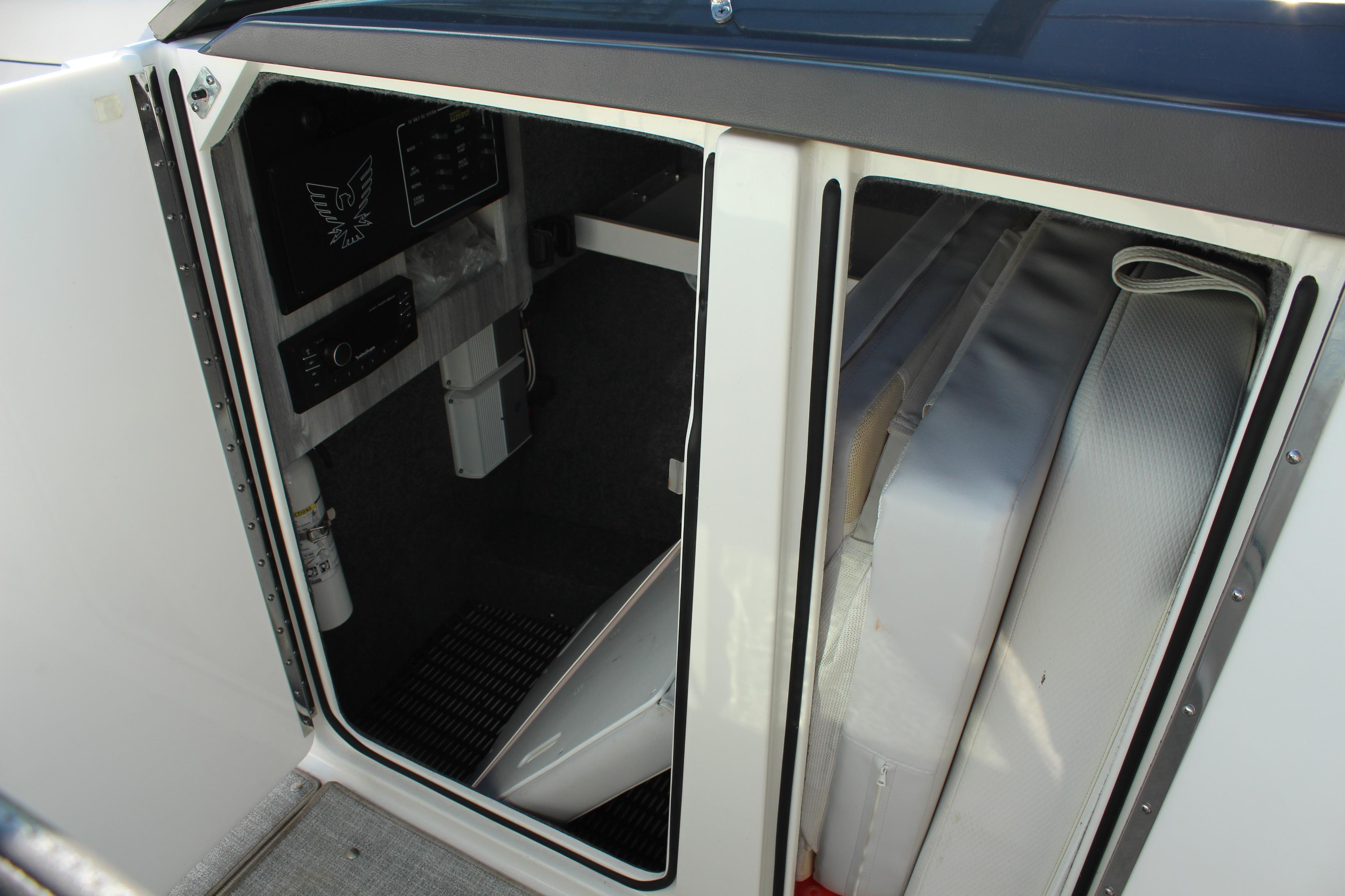 2023 Formula 310 Bowrider I/O cabin interior with seating and control panel.