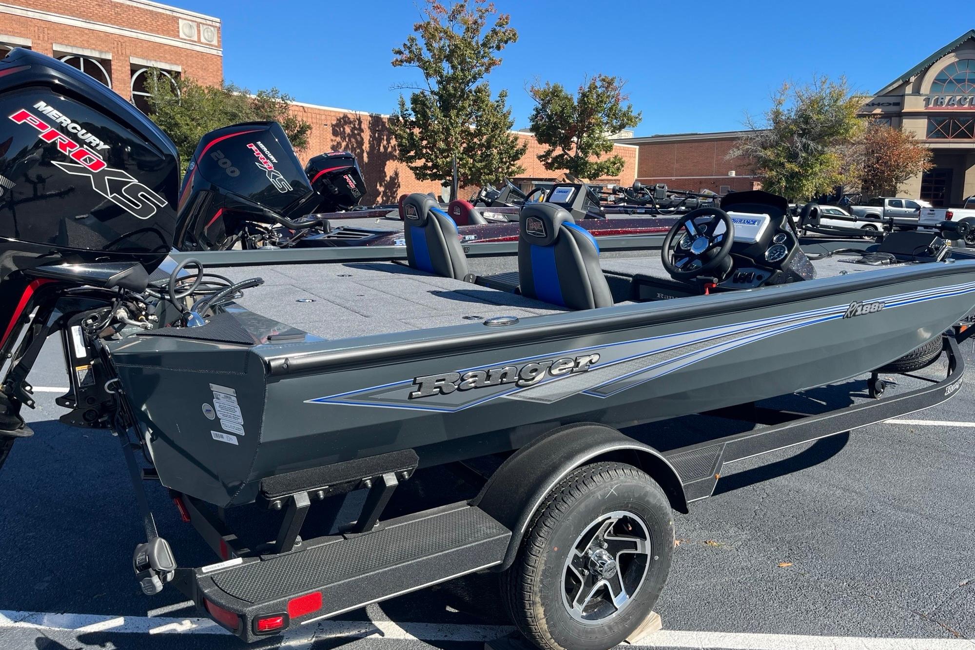 2025 Ranger RT188P boat with Mercury Pro XS engine in a parking lot.