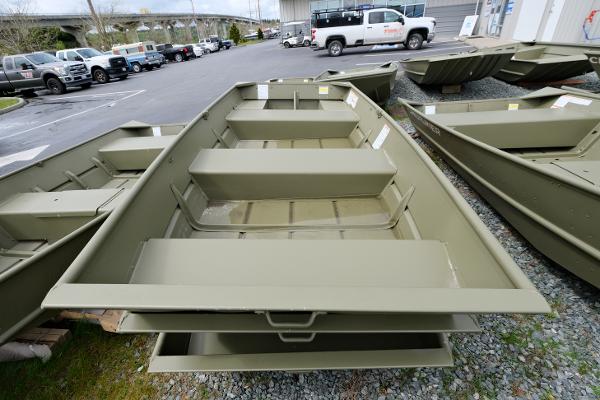 2024 Crestliner 1040 CR Jon boat displayed in a dealership lot.