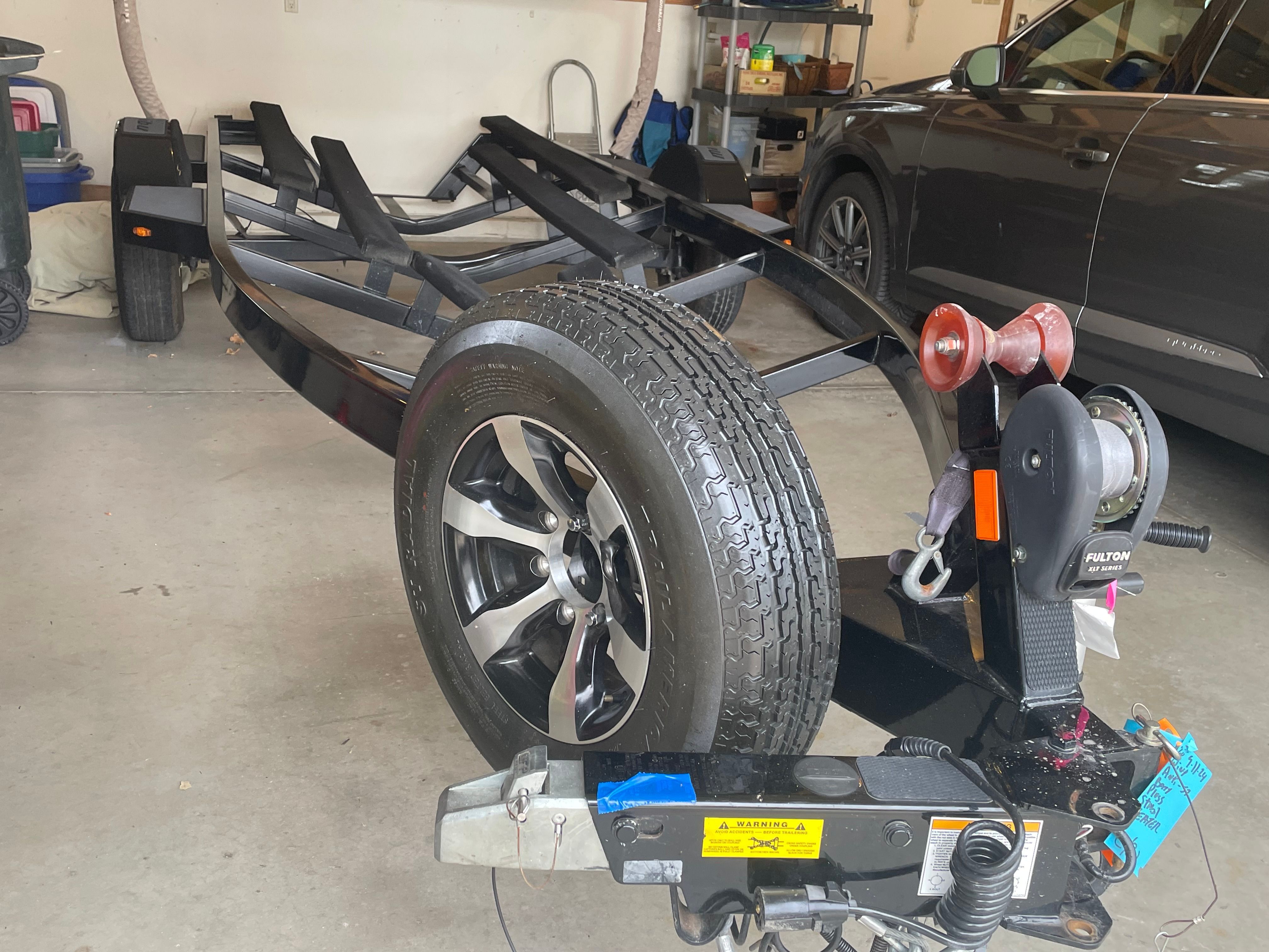 Boat trailer in garage, Malibu Response TXi 2014.