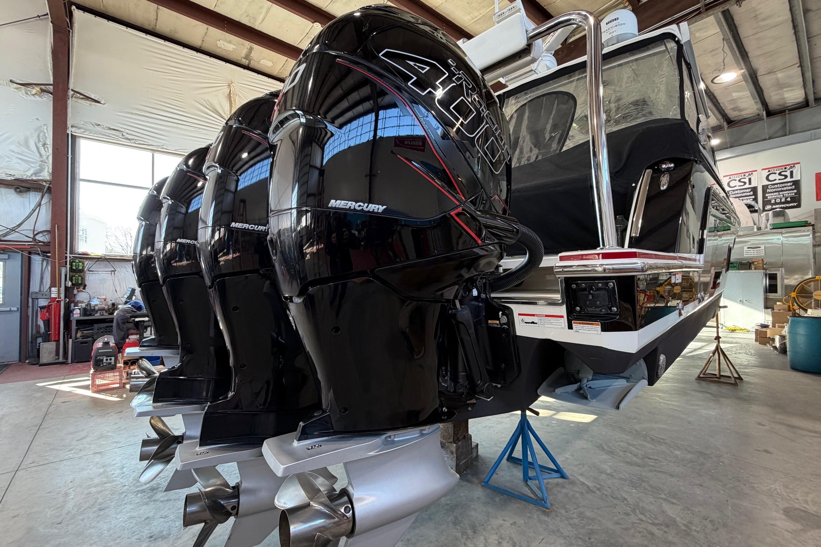 2017 Formula 430 Super Sport Crossover with Mercury engines in a workshop setting.