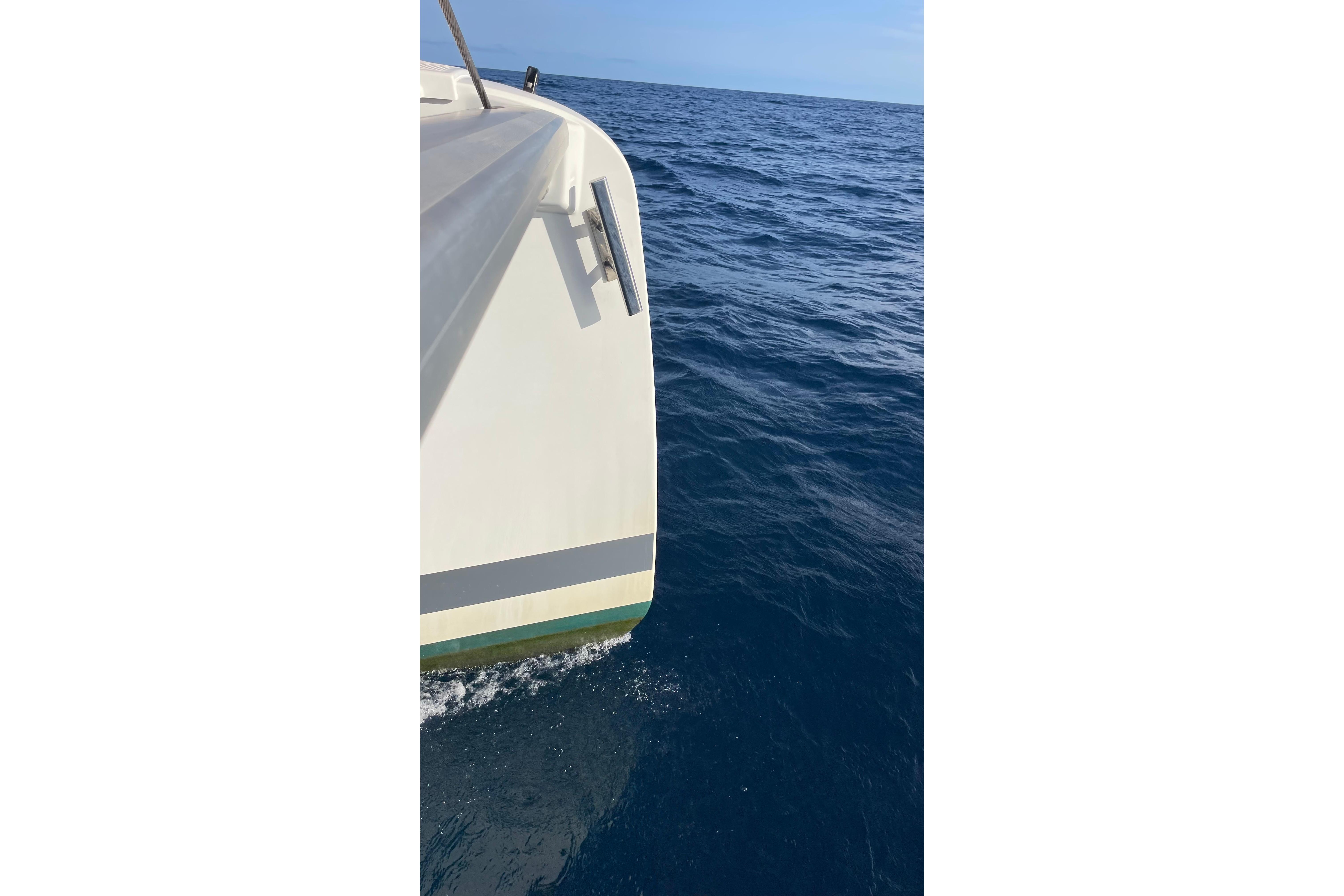 Fountaine Pajot Saona 47 catamaran sailing on open sea, 2020 model.