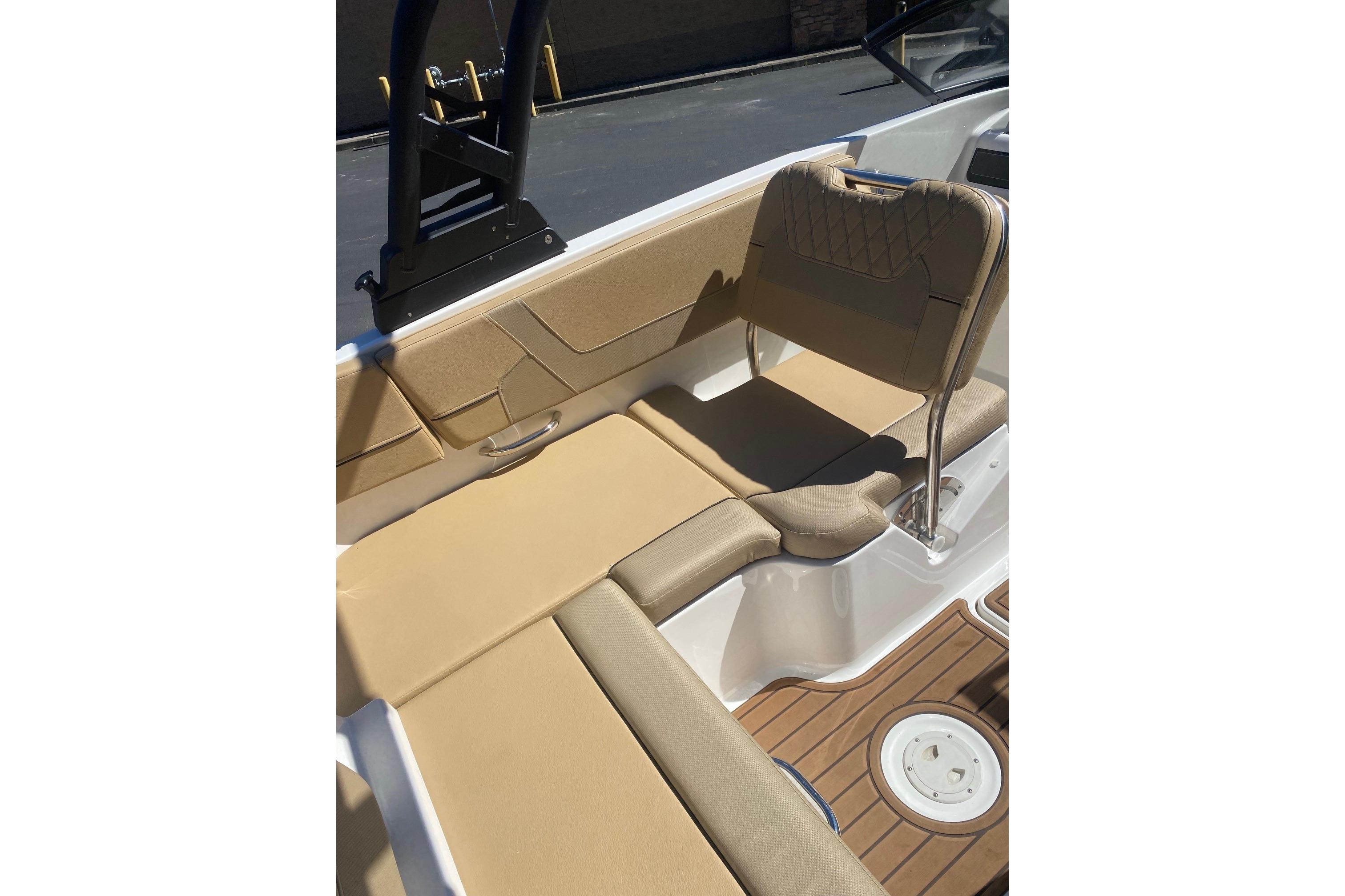 2023 Bayliner VR5 Bowrider I/O interior with tan seating and sleek design.