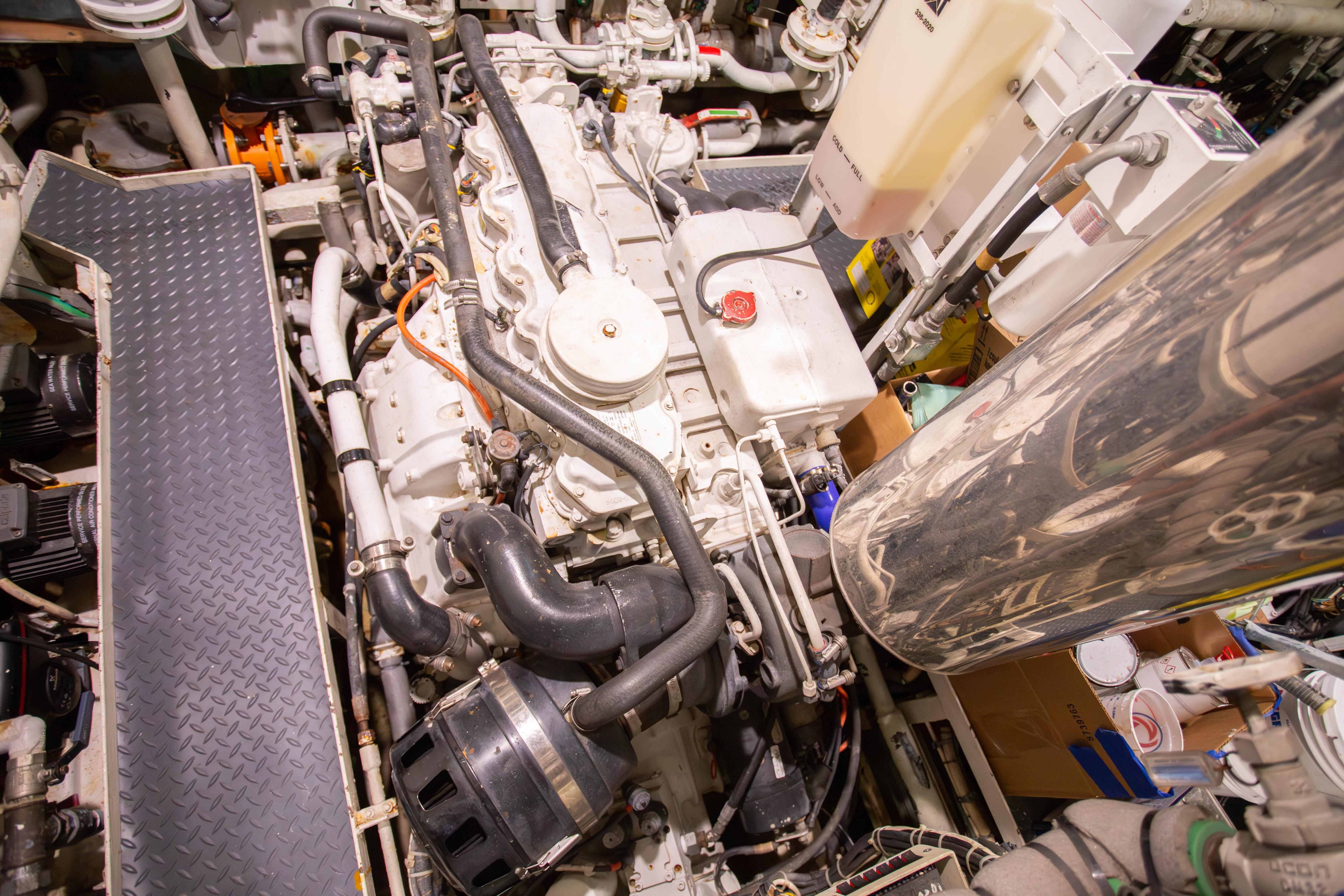 Engine room of 2014 Fifth Ocean Yachts 24m Displacement Explorer Yacht, showcasing machinery and components.