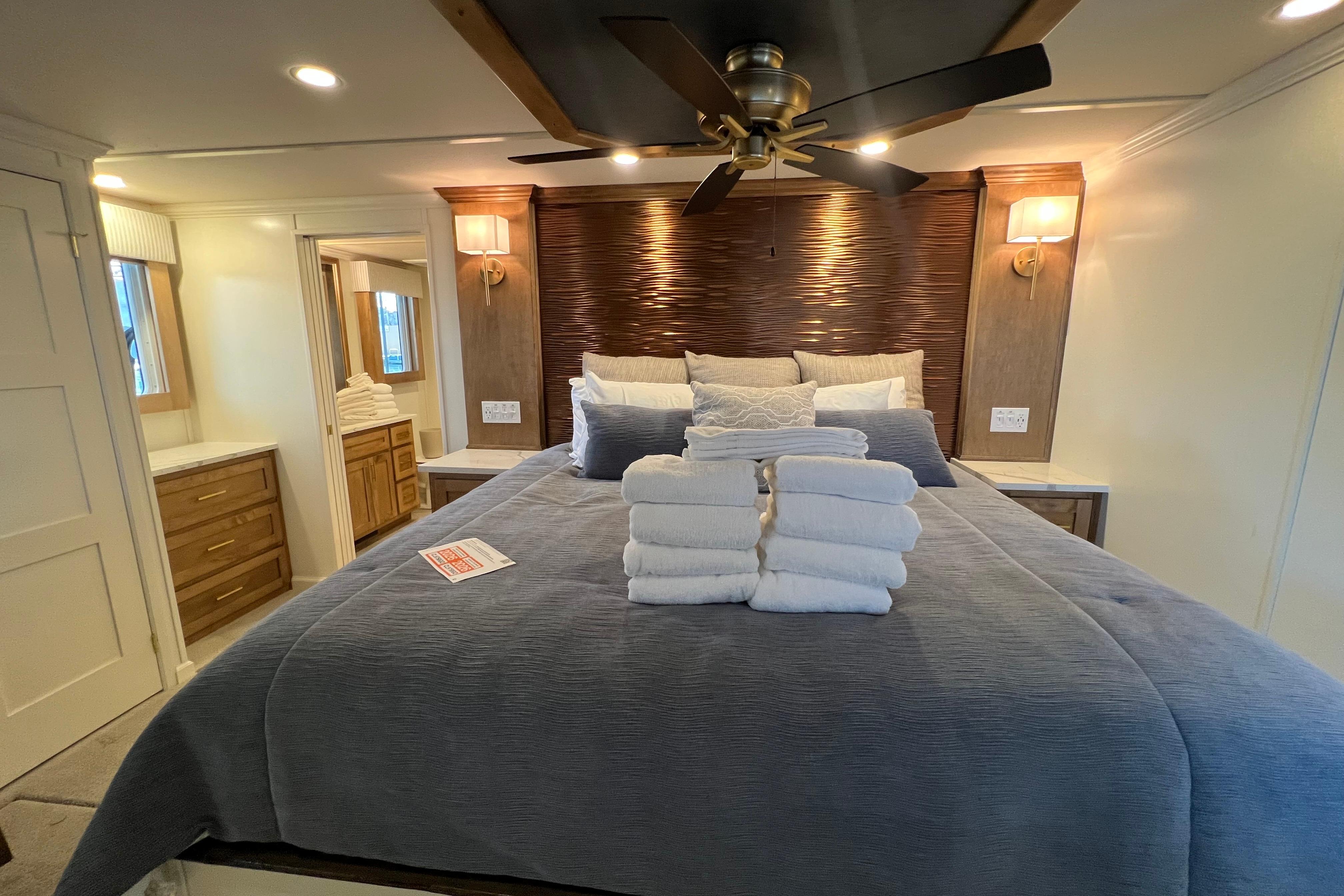 Luxurious bedroom in 2025 Sumerset Excellence Multiple Shares houseboat, featuring elegant decor and plush bedding.