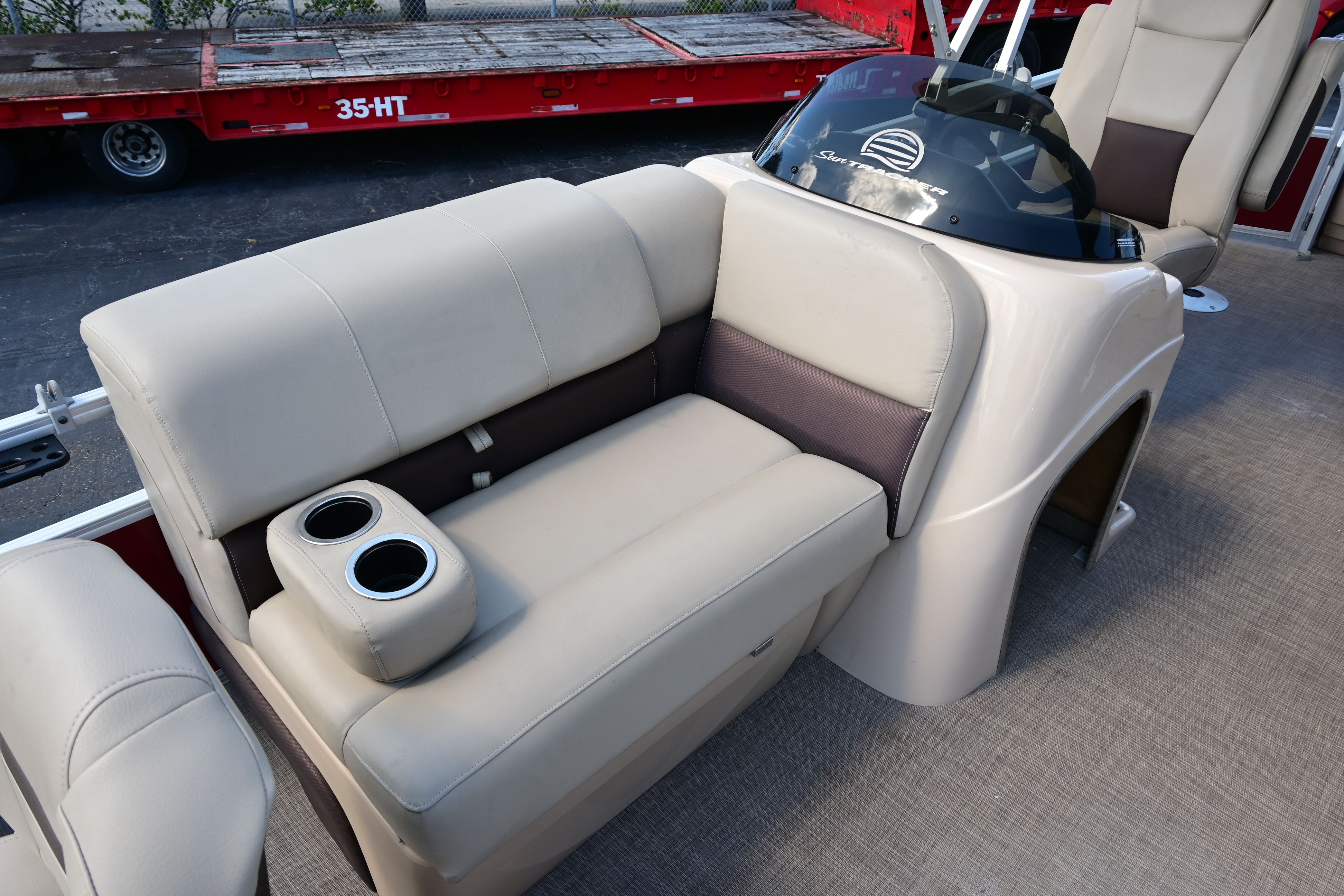 Interior of a 2019 Sun Tracker FISHI boat with beige seating.