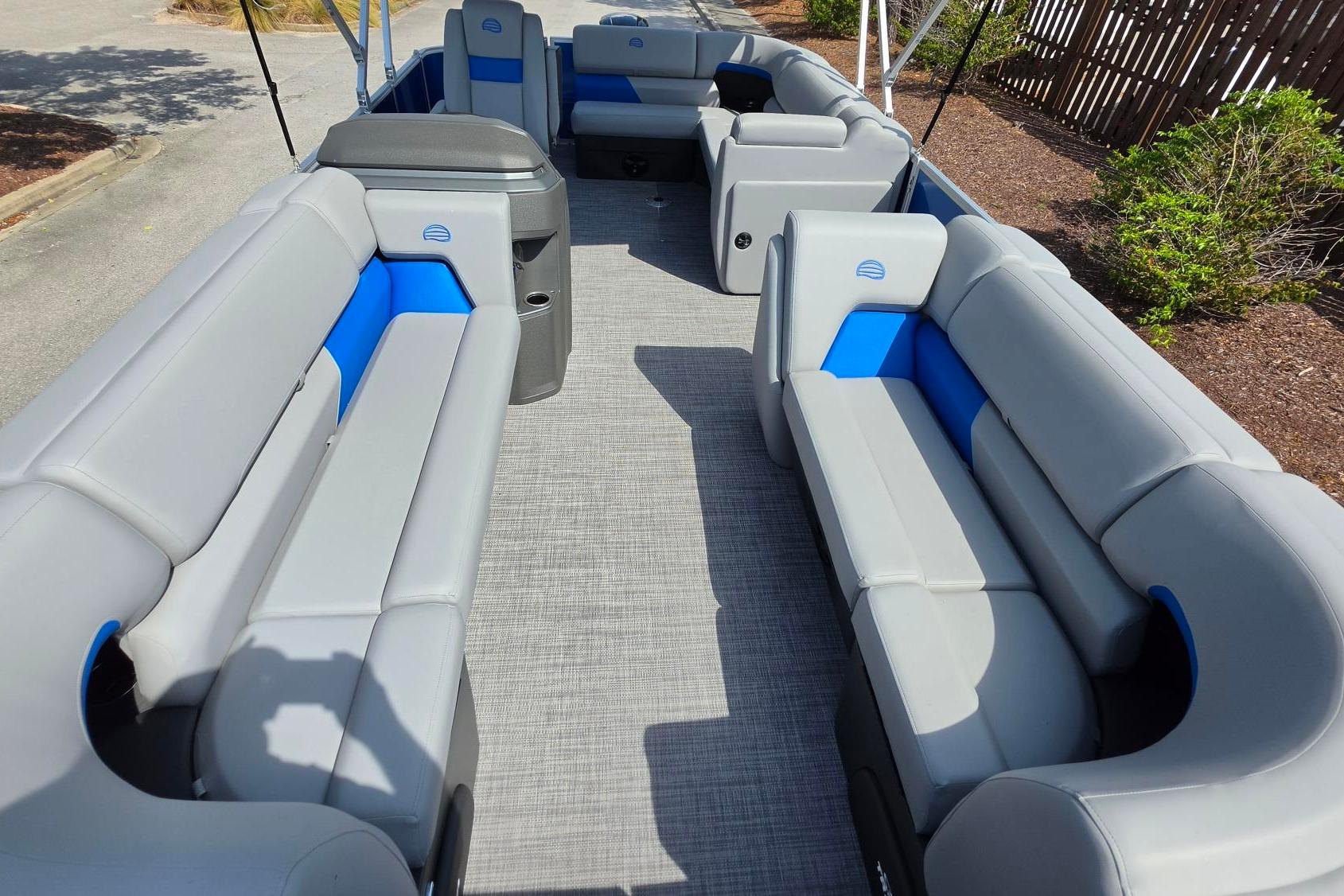 2026 Sun Tracker Party Barge 20 DLX interior with spacious seating and modern design.