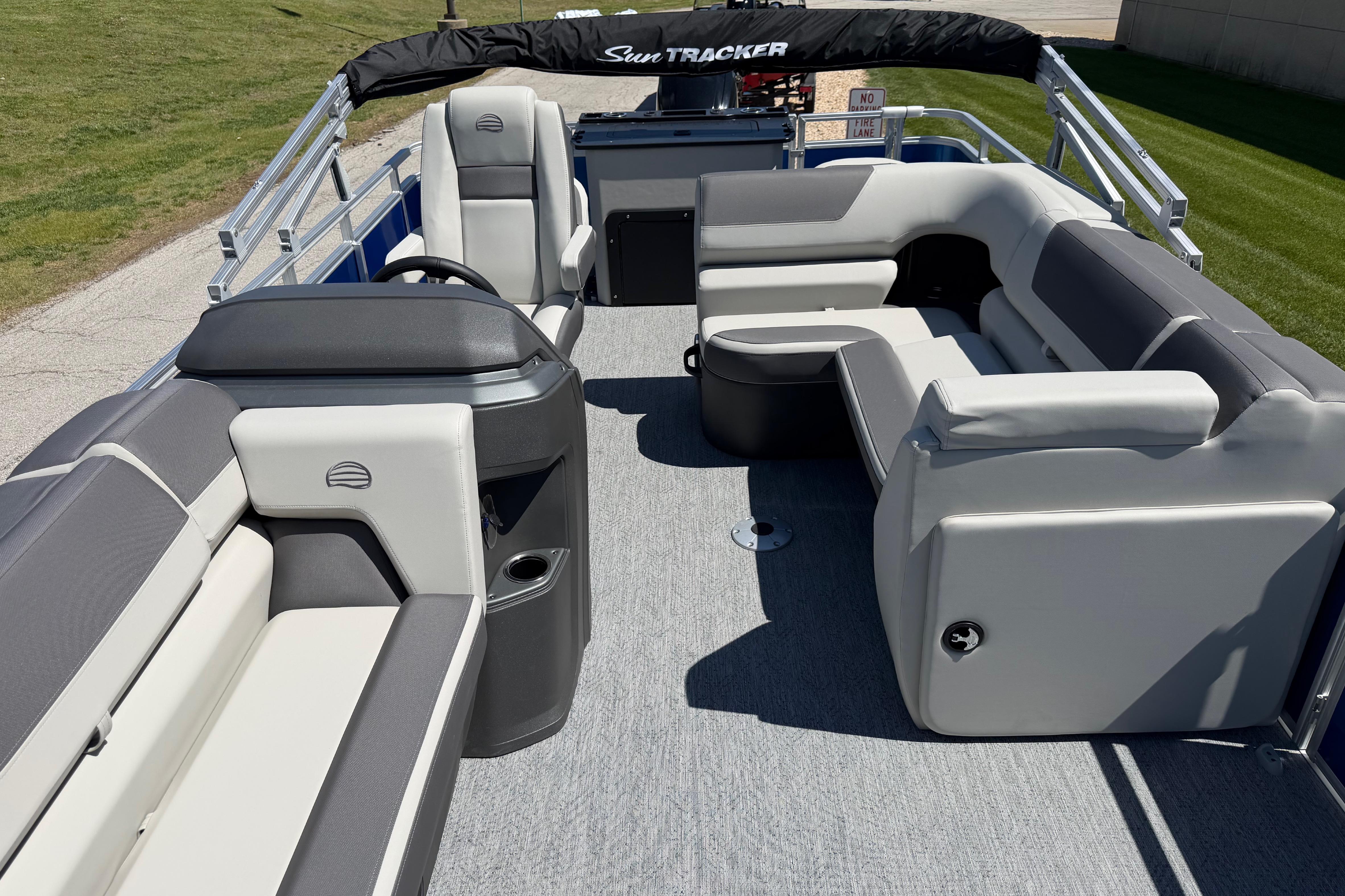 2026 Sun Tracker Fishin' Barge 20 DLX interior with spacious seating and modern design.
