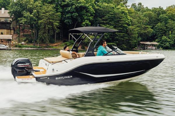 Manufacturer Provided Image: 2025 Bayliner D20 boat cruising on a lake with lush green trees in the background.