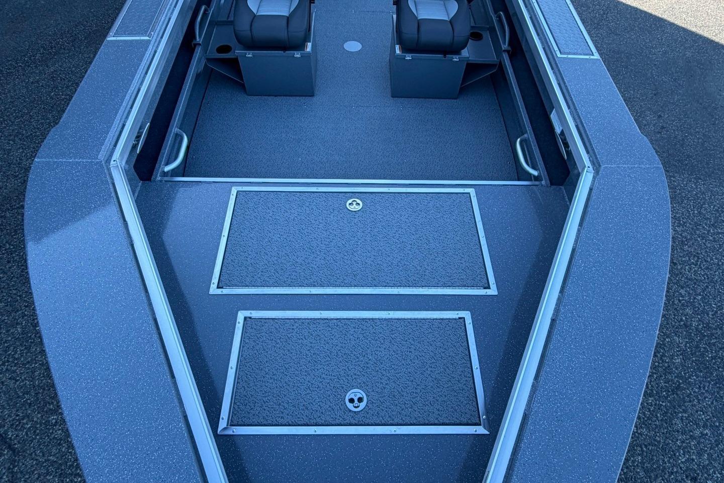 2026 Thunder Jet 209 Rush OT boat interior with seating and storage compartments.