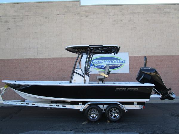 2025 Sea Pro 230 Bay boat on trailer at Grand Pointe Marina.