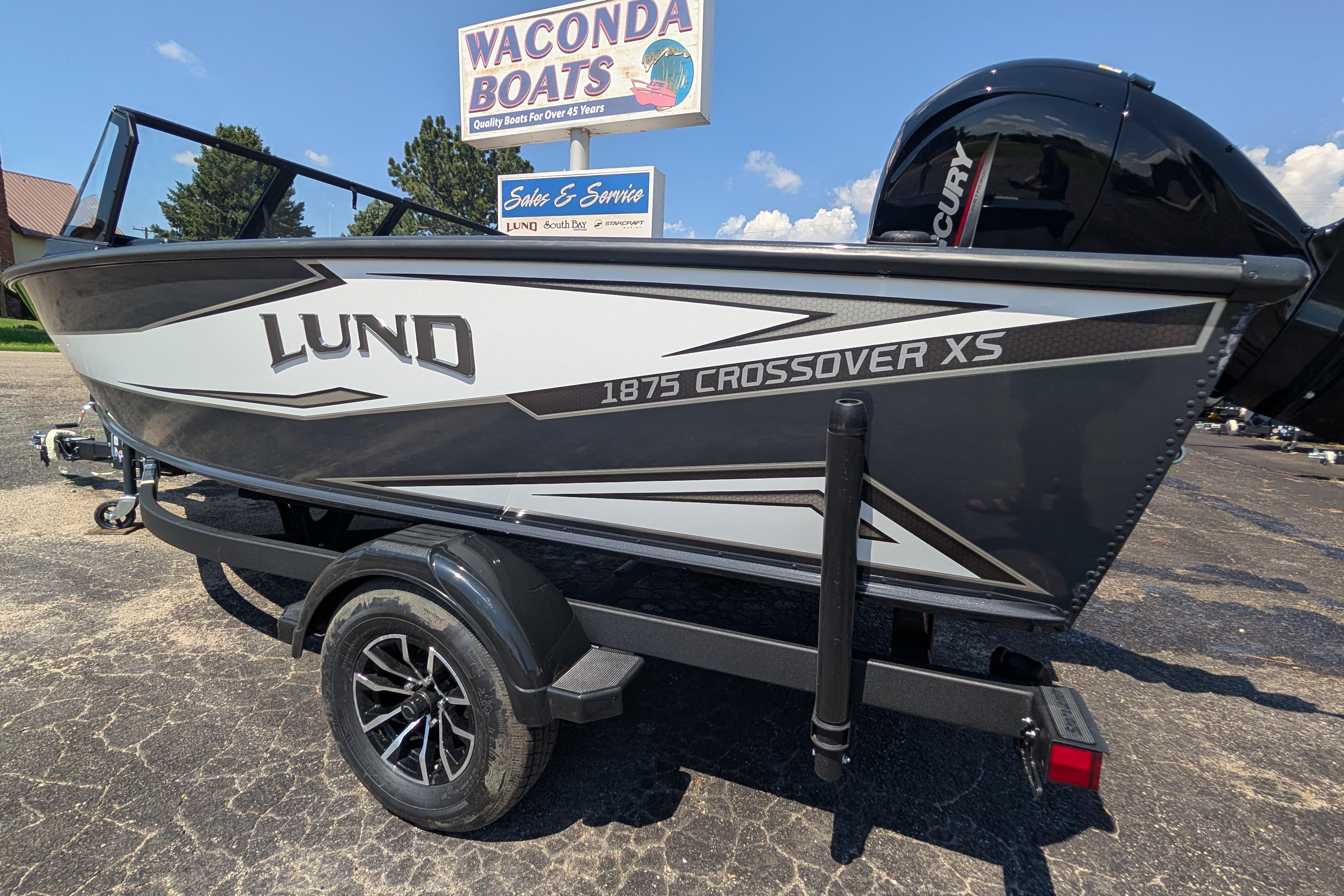 2026 Lund 1875 Crossover XS boat on trailer at Waconda Boats dealership.