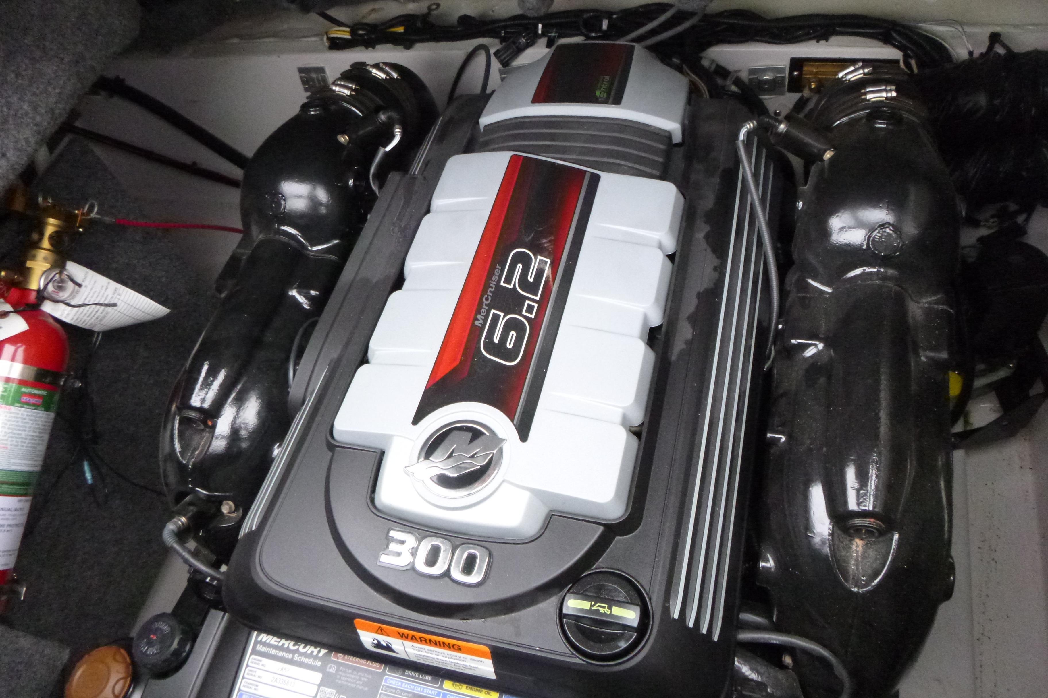 Engine compartment of a 2017 Four Winns H260 boat featuring a 6.2L MerCruiser engine.