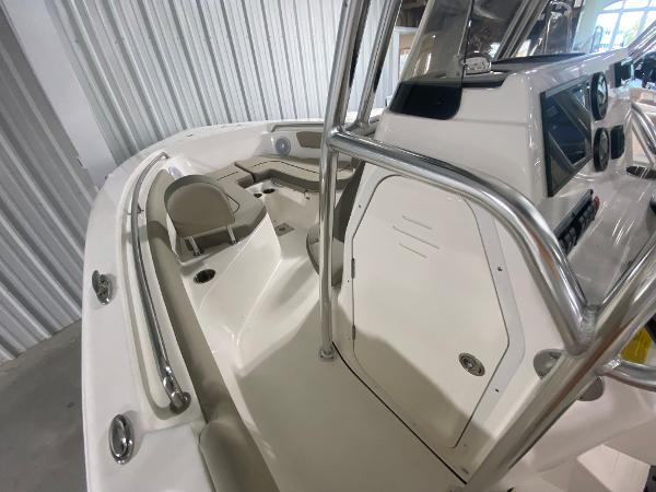 2024 Key West 203 FS boat interior with seating and console.