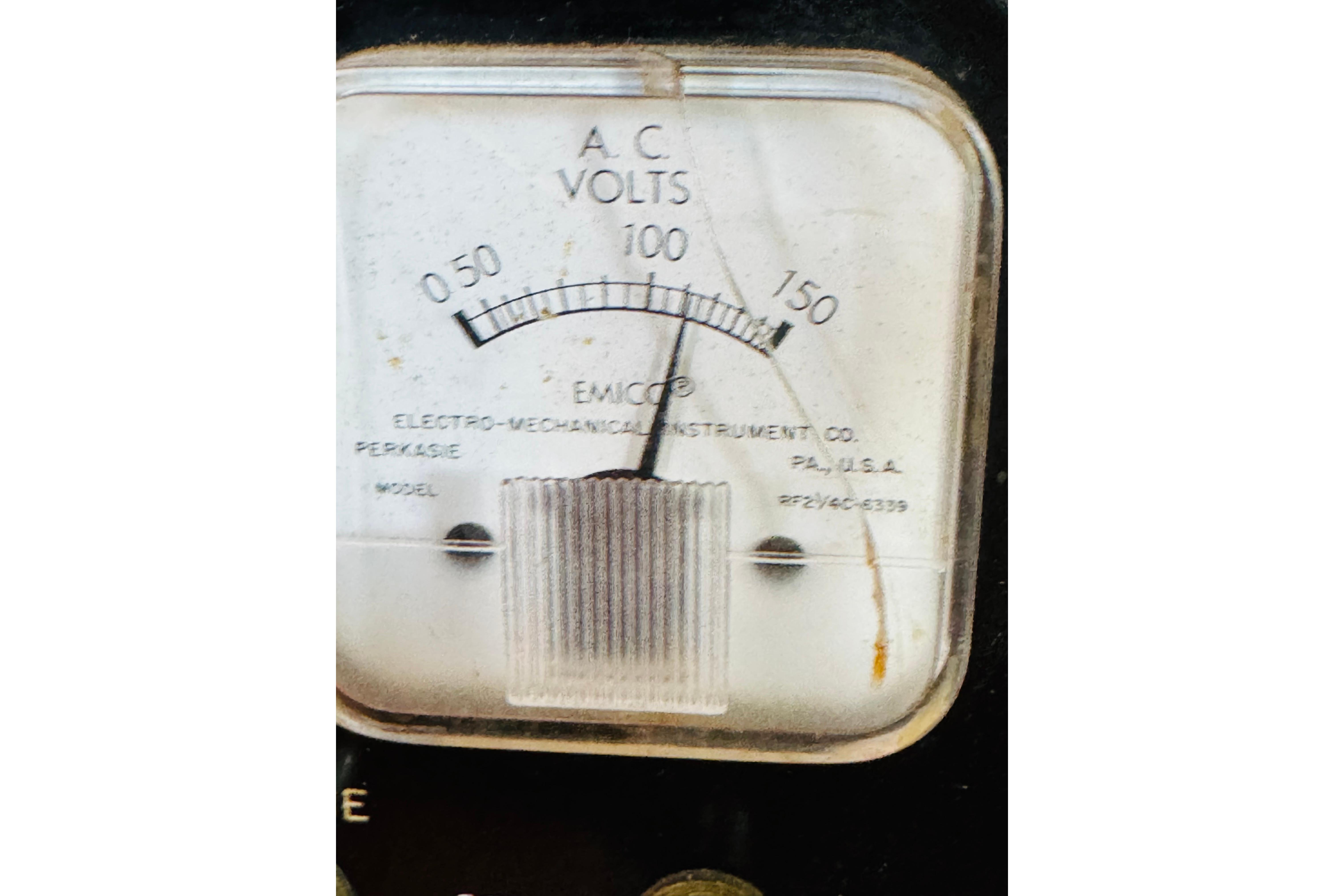 Vintage voltmeter gauge on 1978 Californian 42 LRC boat, measuring AC voltage.