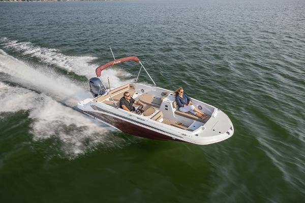 2025 Hurricane SunDeck Sport 205 OB cruising on open water.