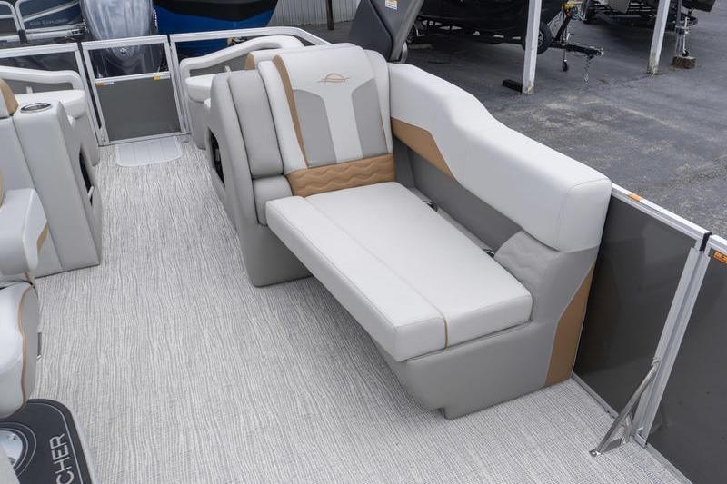 Luxurious seating on 2026 SunCatcher Elite 326 SS pontoon boat, featuring elegant design and comfort.