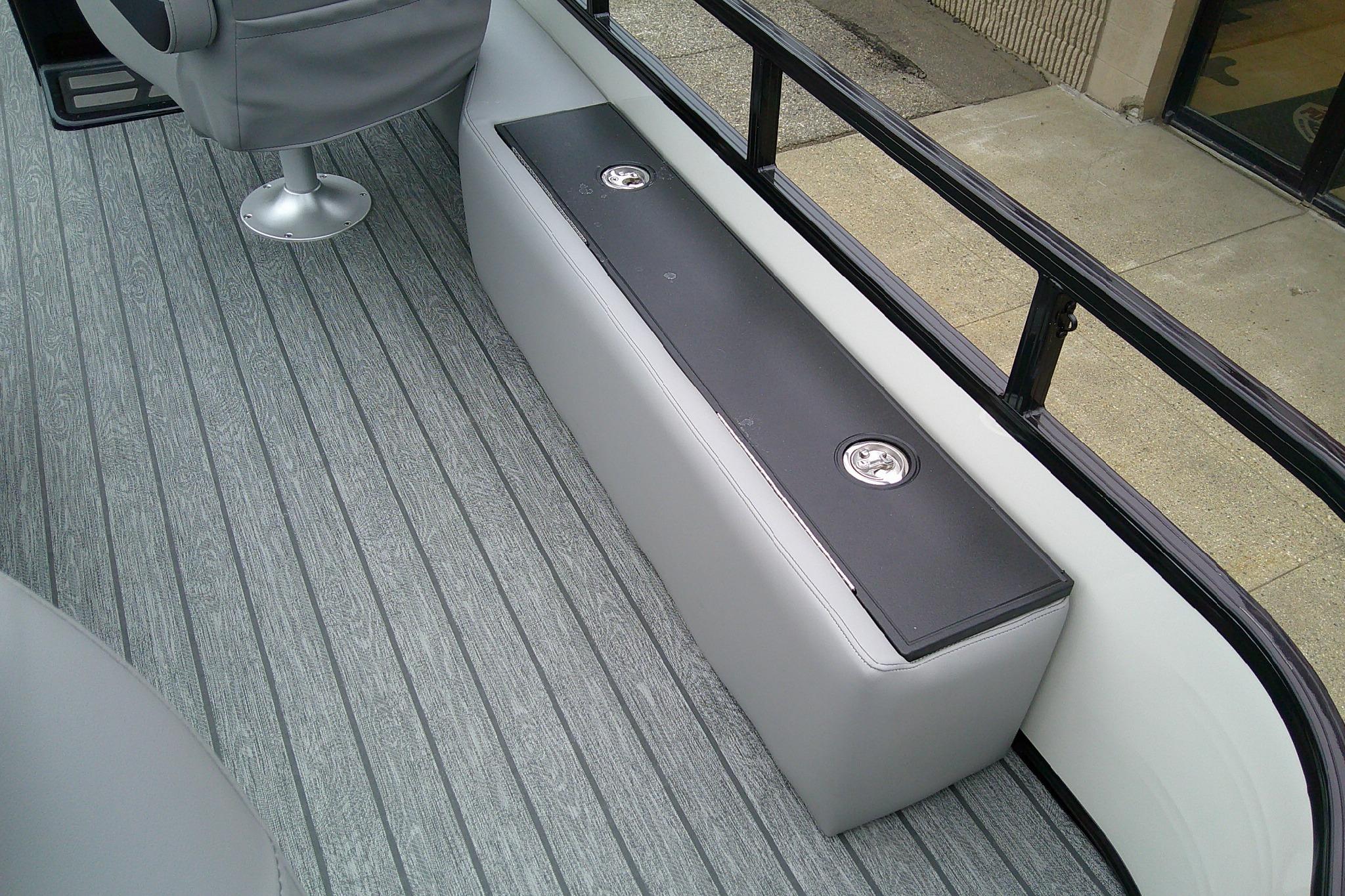 2026 Ranger 220F boat interior with gray seating and flooring.