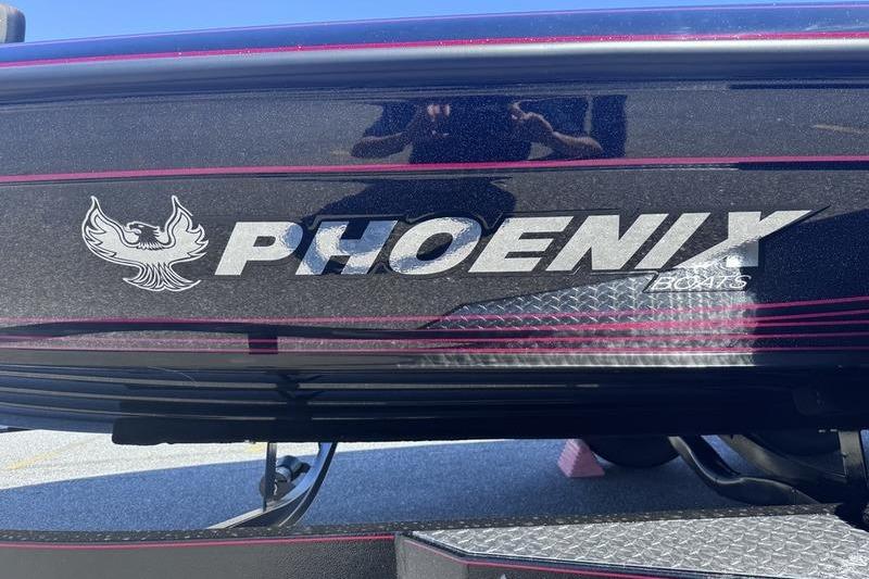 2026 Phoenix 819 ZXL boat logo with sleek design and metallic finish.