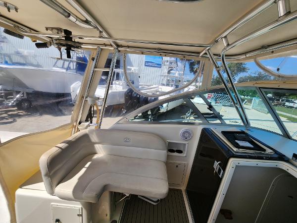 2005 Pursuit 3070 Offshore Center Console interior with seating and helm station.