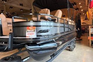 2026 Ranger 220FC pontoon boat displayed indoors, featuring sleek design and comfortable seating.