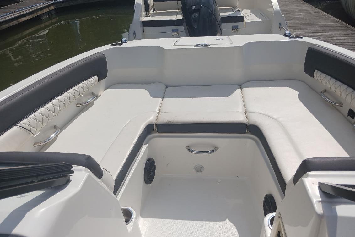 2023 Bayliner DX 2200 boat interior with spacious seating and modern design.