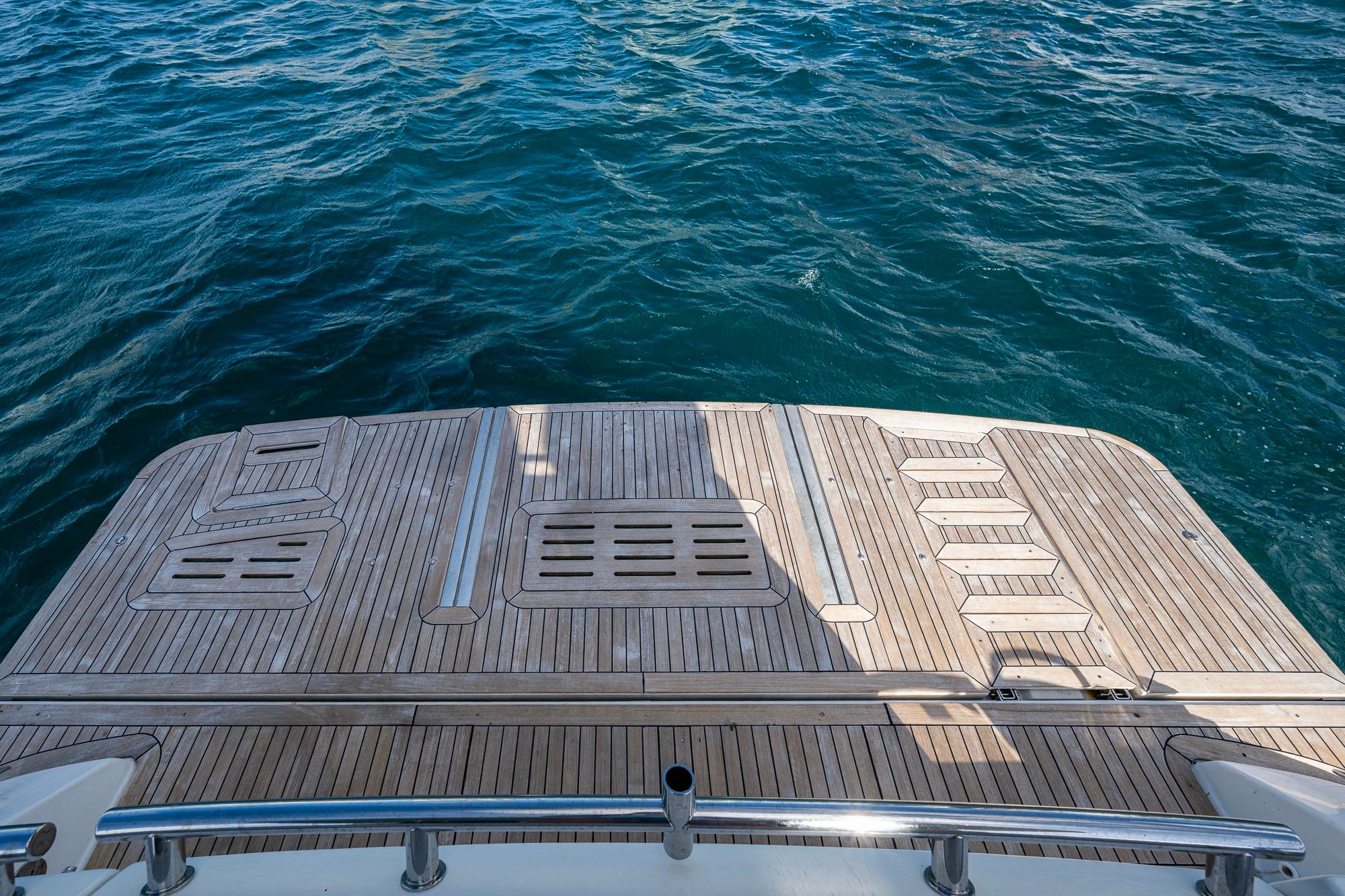 2018 Sea Ray L550 Fly yacht deck with ocean view.
