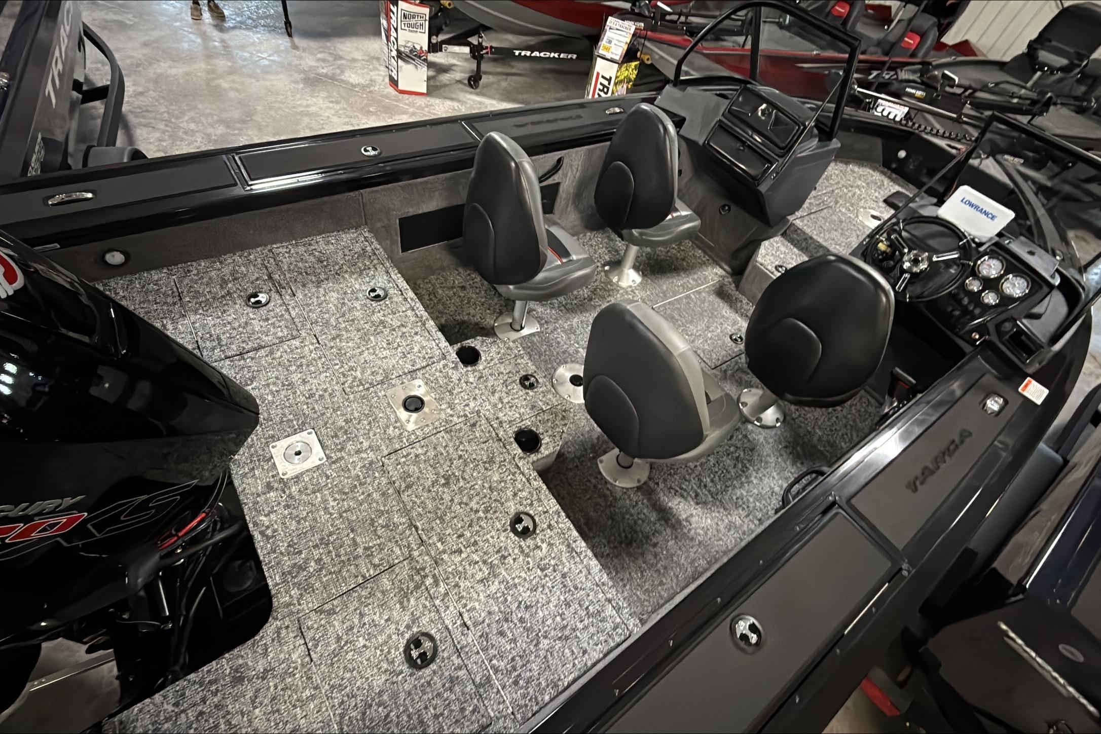 2026 Tracker Targa V-18 WT boat interior with seating and dashboard view.