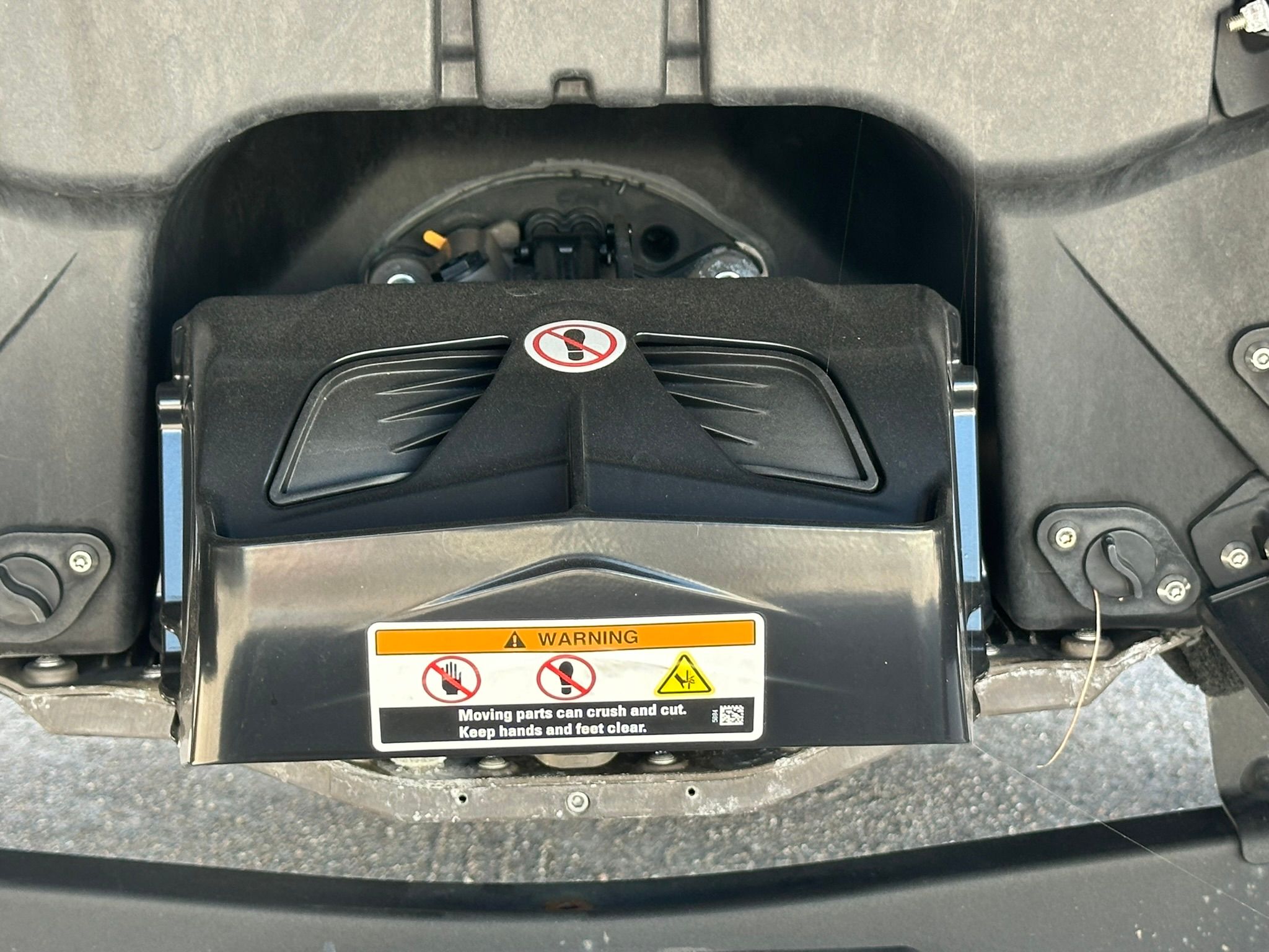 Close-up of a part of a 2023 Sea-Doo 21 SWITCH SPORT with warning labels.