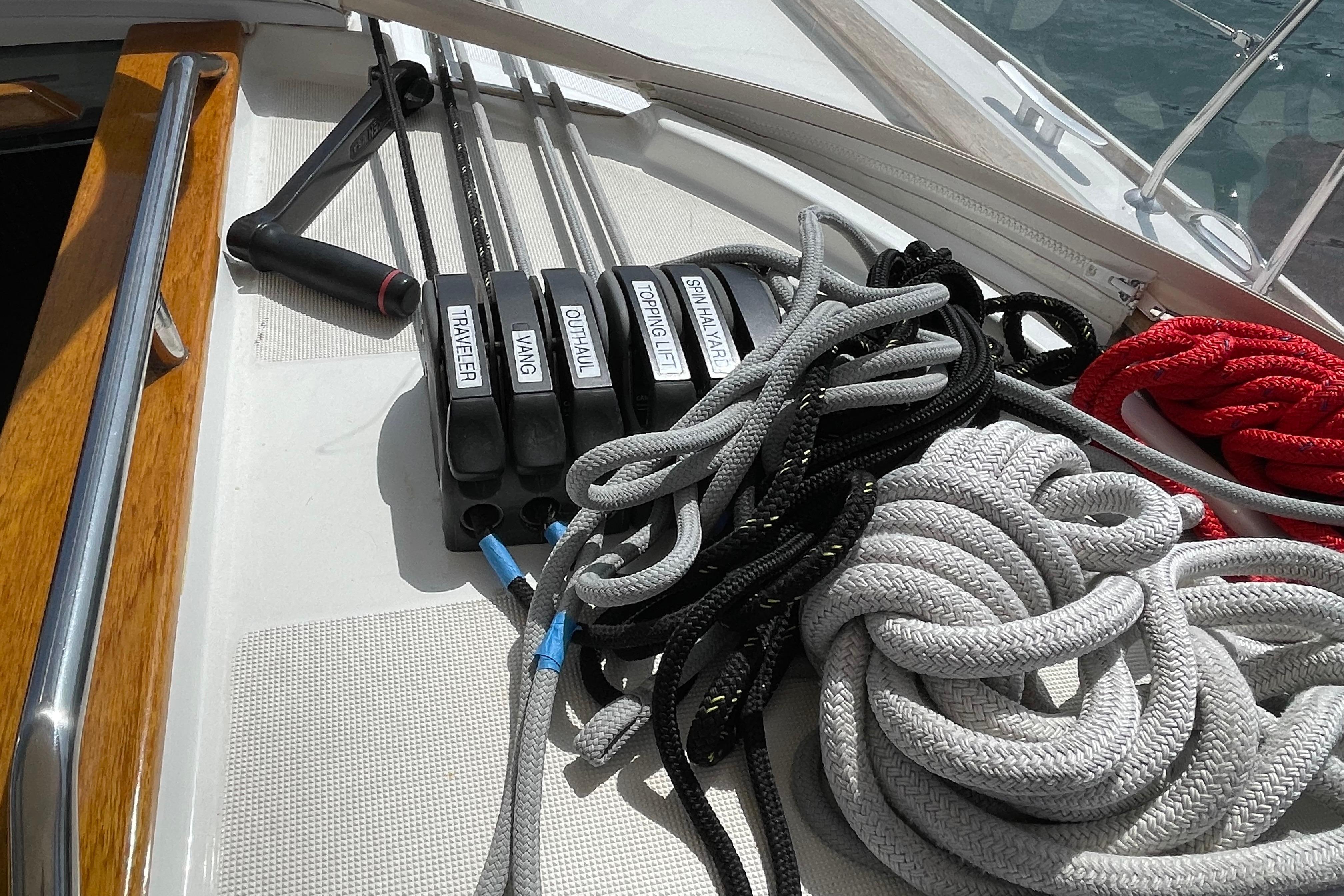 Deck of 2007 Jeanneau Sun Odyssey 39 DS with ropes and labeled controls.