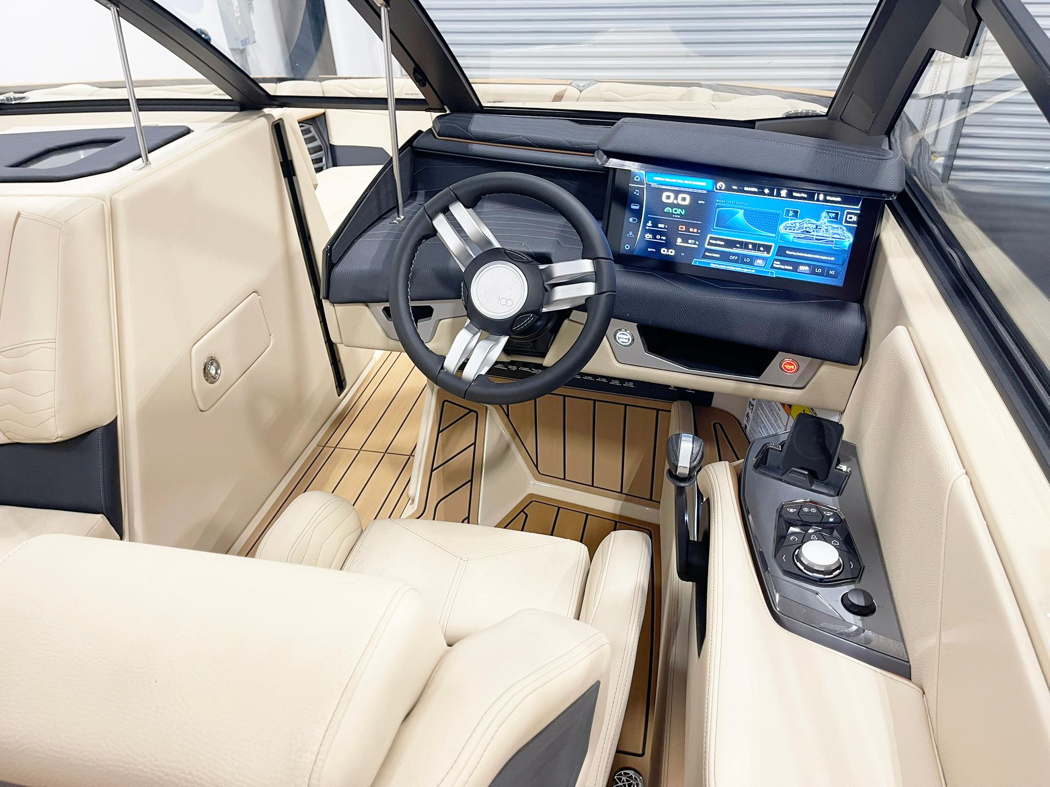 2025 Nautique Super Air Nautique G25 interior with modern dashboard and touchscreen display.