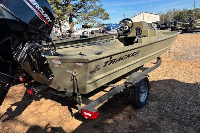 2026 Tracker Grizzly 1648 SC boat on trailer with Mercury outboard motor.