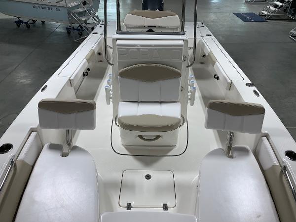 2026 Robalo 226 Cayman boat interior with seating and storage compartments.