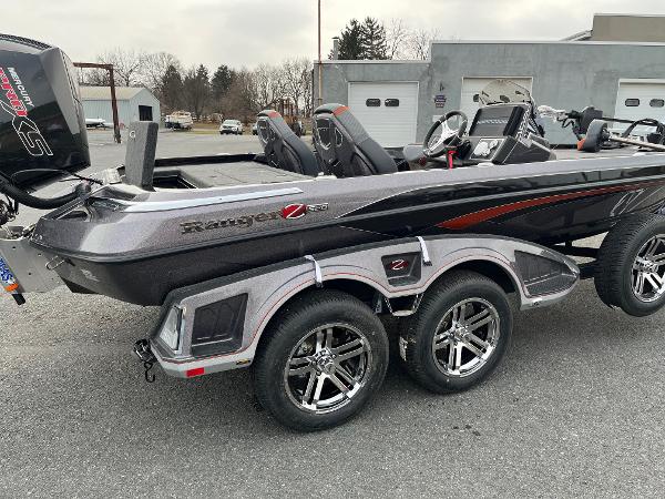 2025 Ranger Z520 boat on trailer, parked outdoors near a building.
