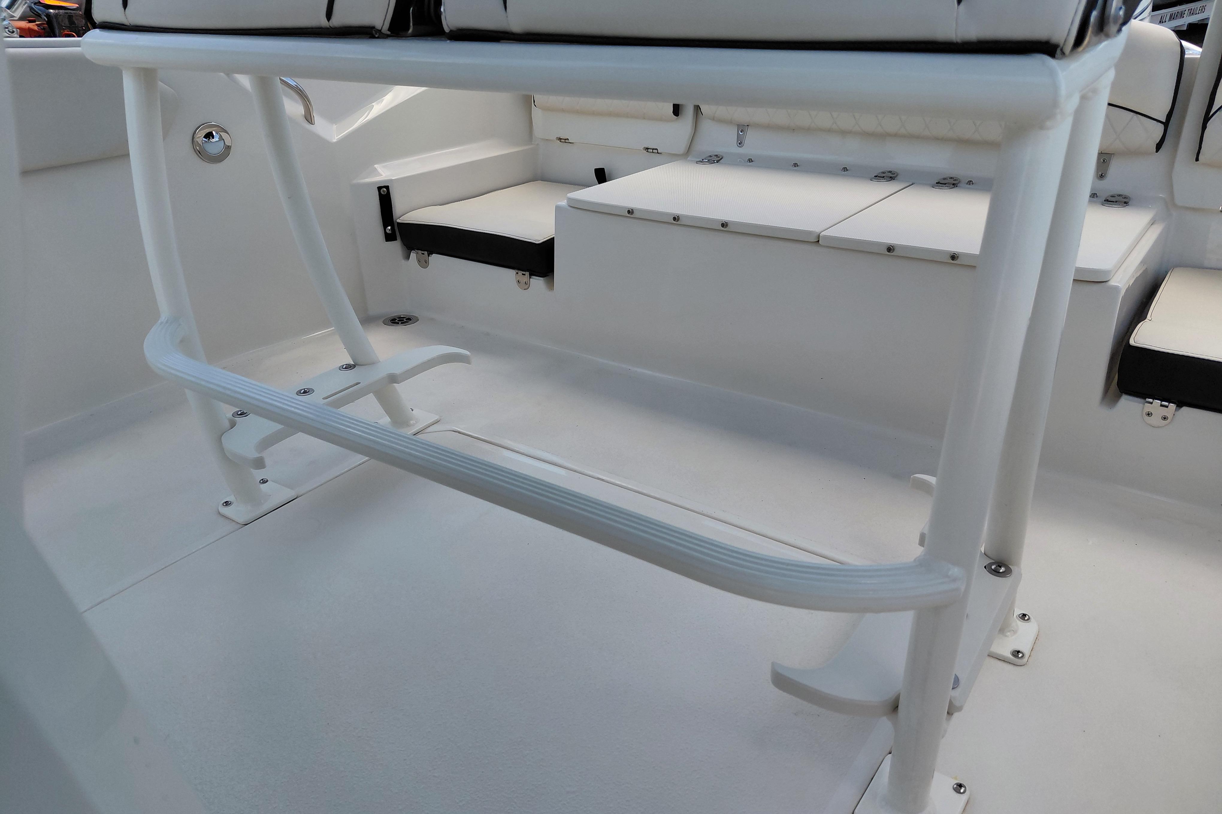 2023 Stingray 206 CC boat interior with white seating and sleek design.