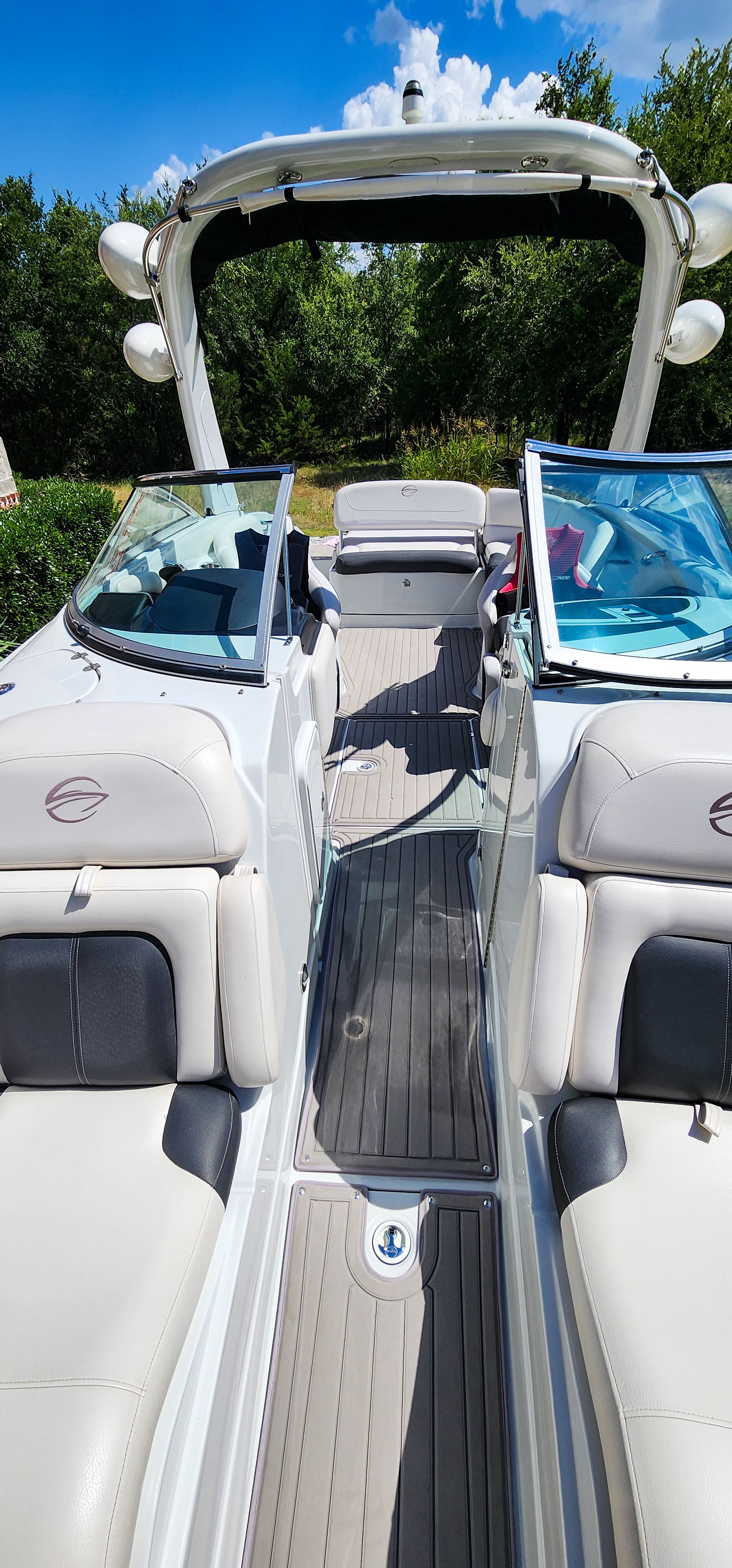 The image shows the interior of a 2017 Crownline 285SS boat with sleek seating.
