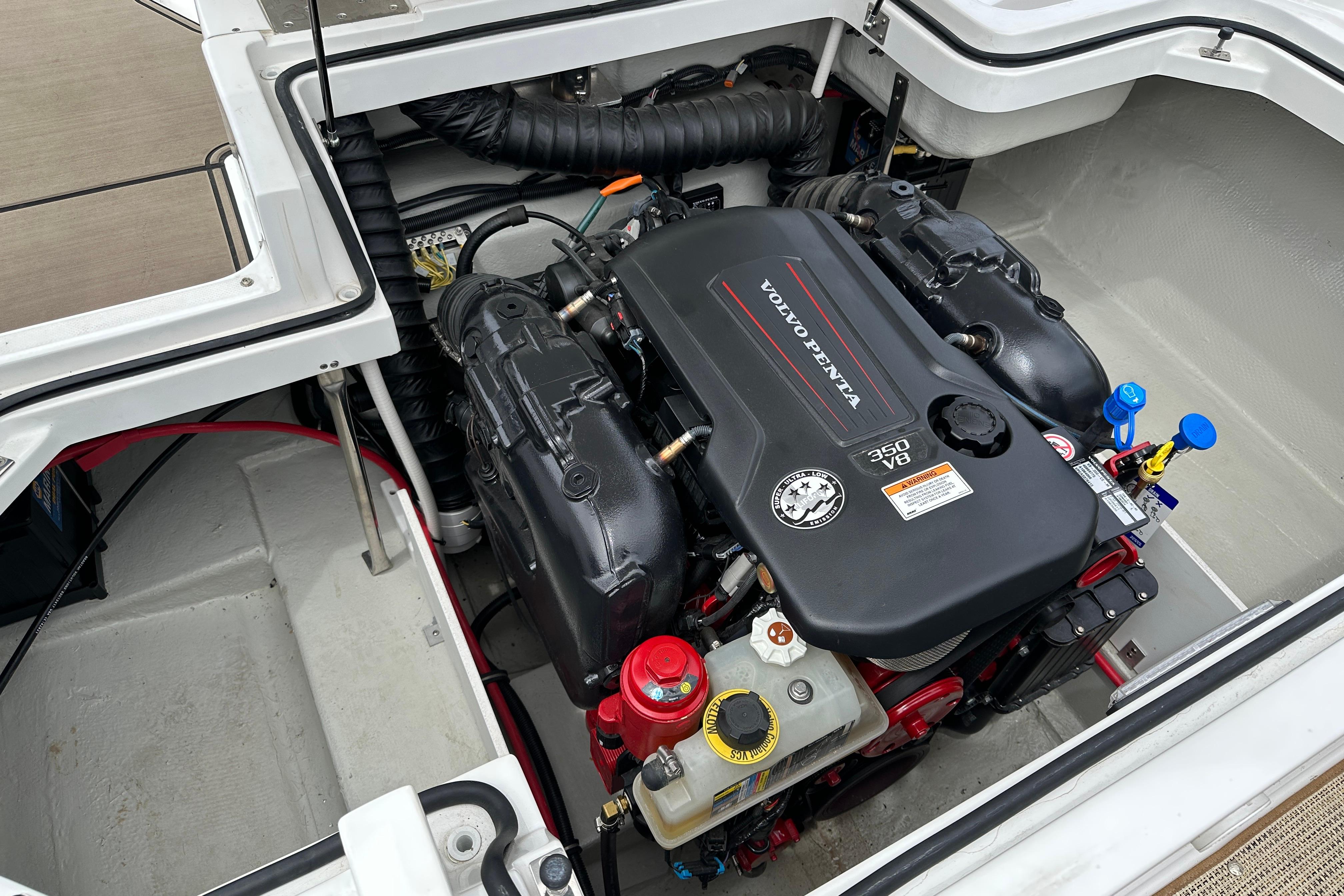 Engine compartment of a 2019 Cobalt R5 boat featuring a Volvo Penta 350 V8 engine.