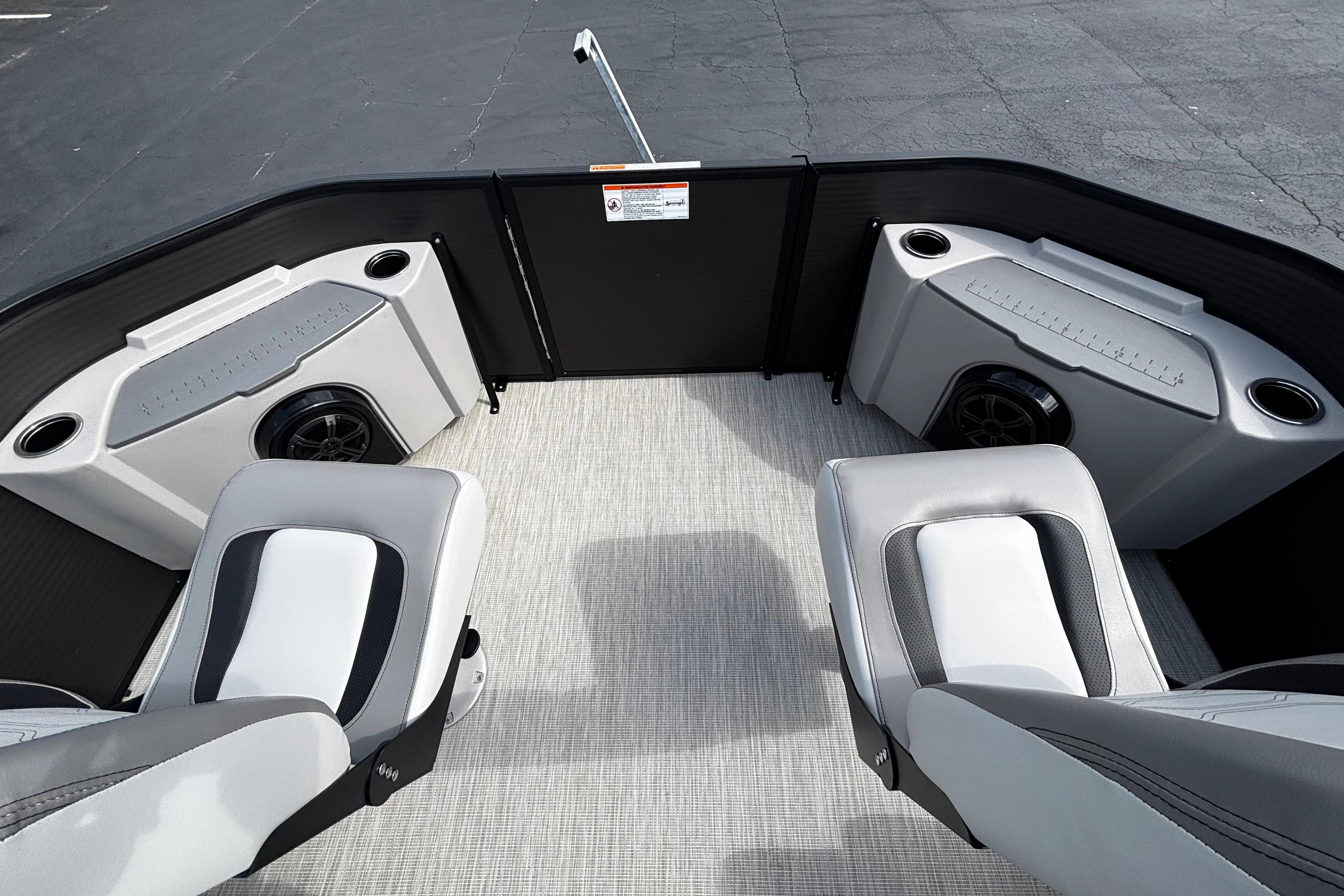Interior of 2026 Princecraft Sportfisher 21-2S boat with seating and storage compartments.
