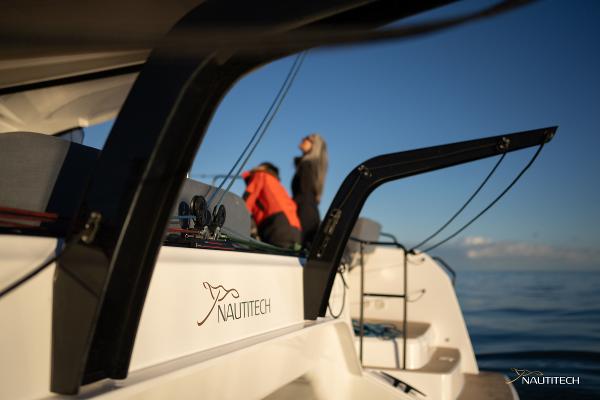 2025 Nautitech 48 Open yacht on calm sea, featuring sleek design and modern amenities.