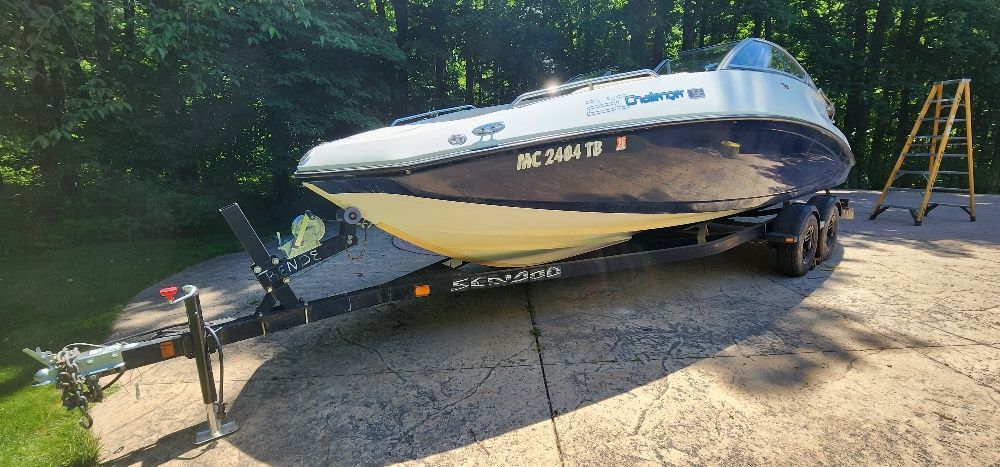 2007 Sea-Doo Sport Boats 230 Challenger SE on a trailer outdoors.