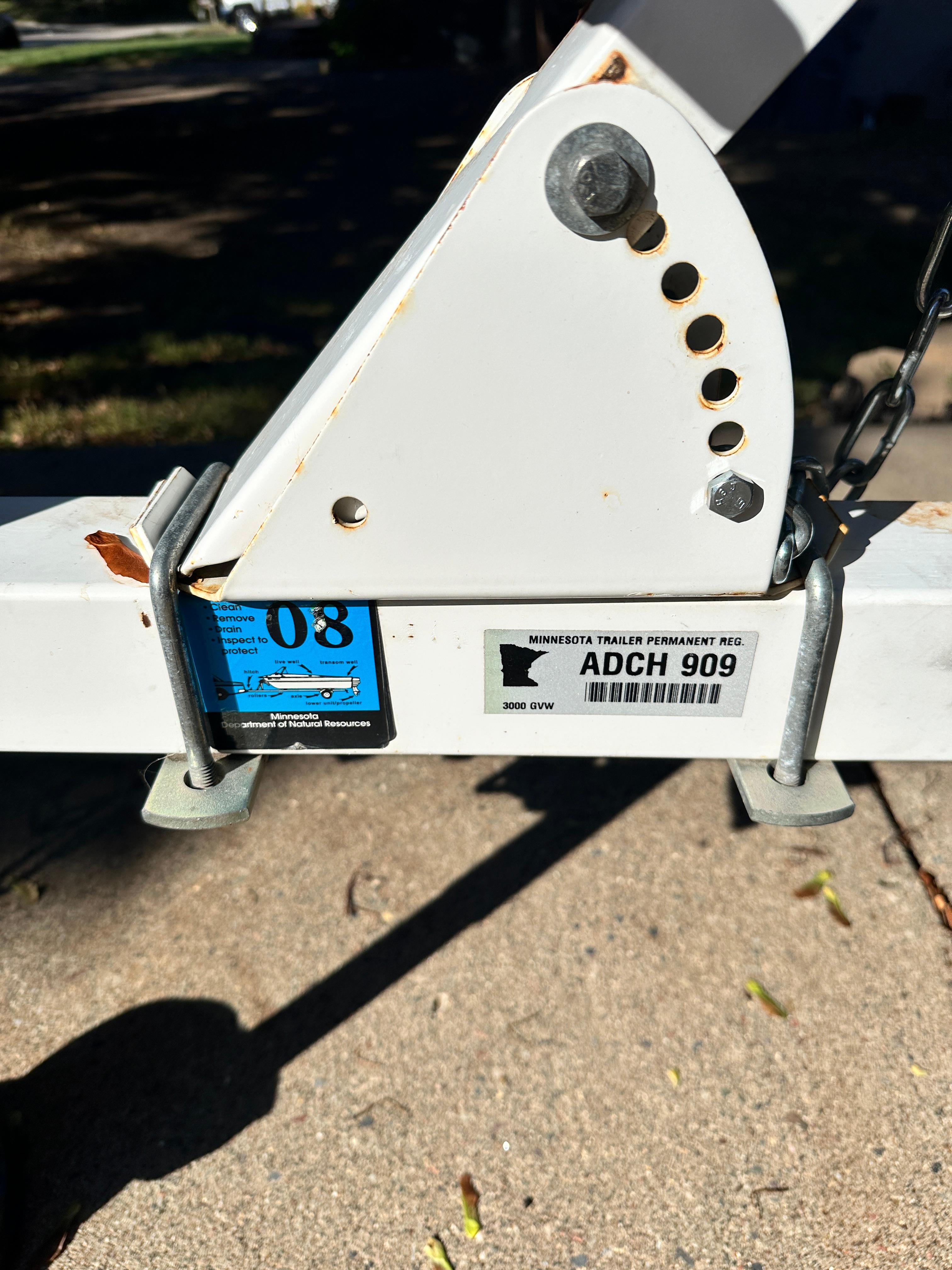 Trailer hitch with Minnesota registration sticker, Lund H model, 1960.